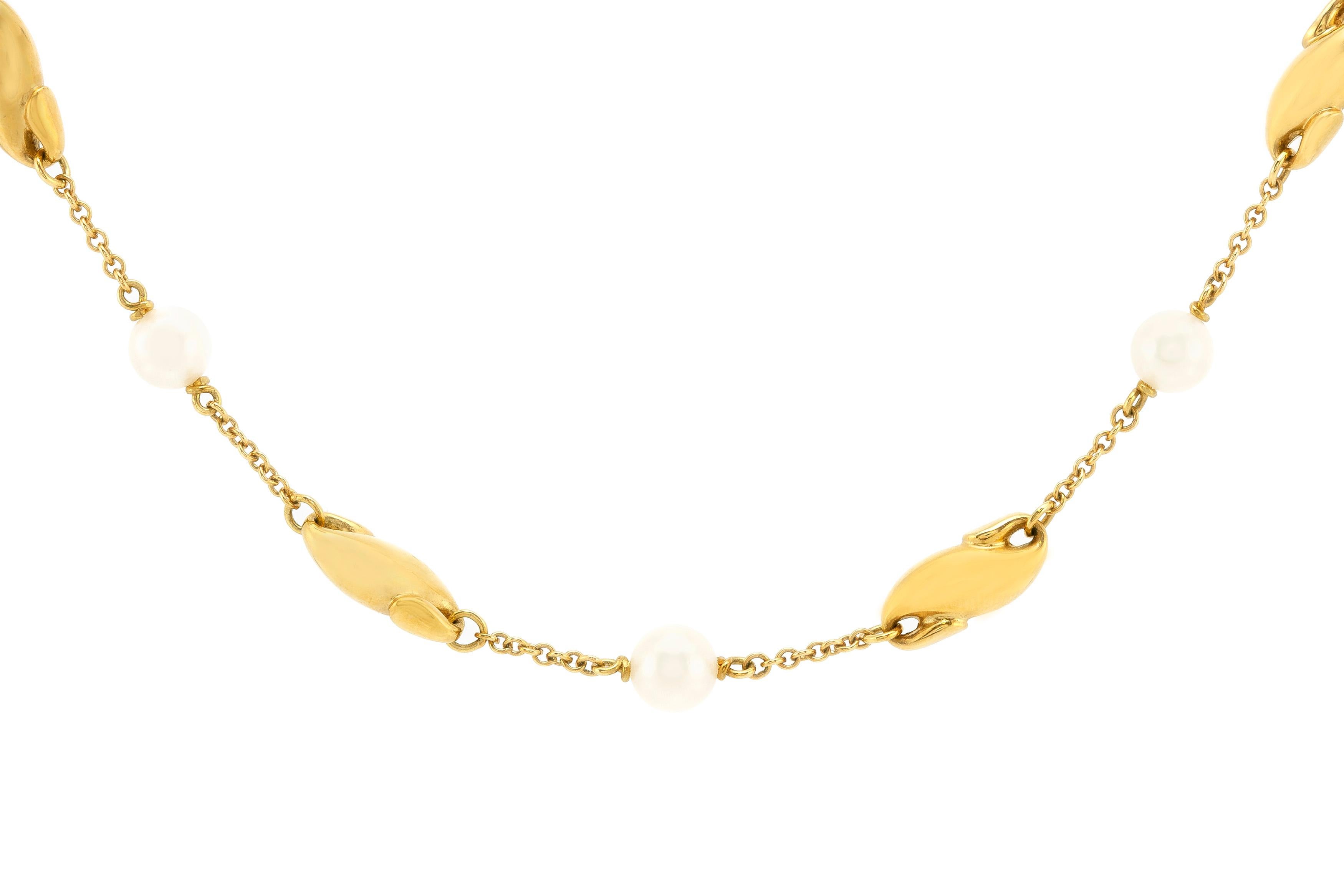 Tiffany necklace is finely crafted in 18K gold with pearls