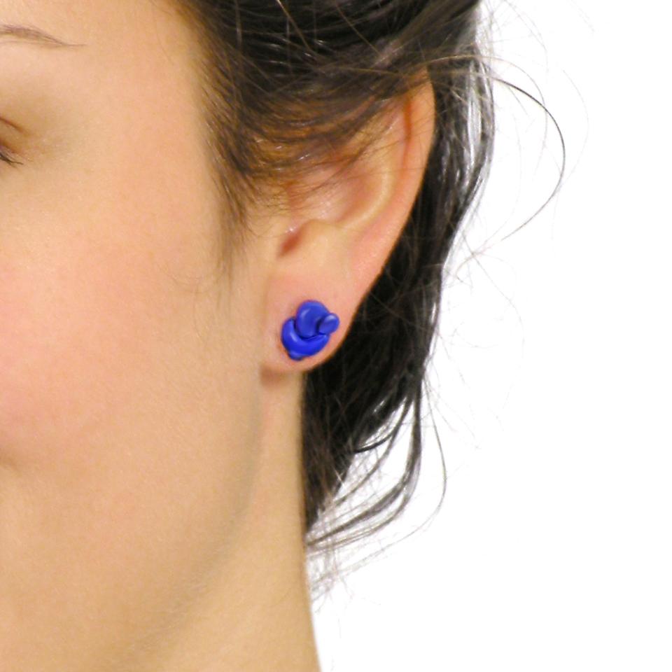 Circa 1970s, 18k, Tiffany & Co. Chic examples of Elsa Peretti's jewelry for Tiffany, these charming knot earrings are beautifully made and set with superb lapis. The look is colorful and smart.  Excellent condition. 

Remark:   “Good things do come