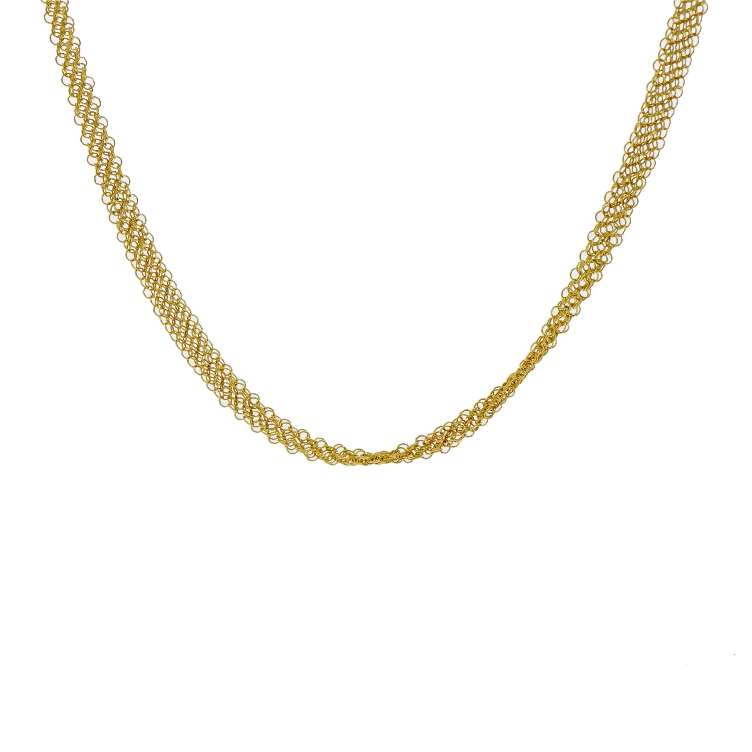 This gorgeous Yellow Gold Mesh Necklace is light and malleable in the way that drapes over the body. 
Designed by Elsa Peretti for Tiffany & Co. in 18k Yellow Gold, measures 30 inches long and weighs 11 Grams.
The Perfect addition to your collection!