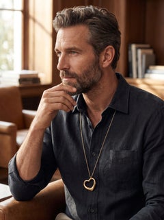 Elsa Peretti for Tiffany & Co. Ciondolo in argento sterling placcato oro a forma di cuore aperto