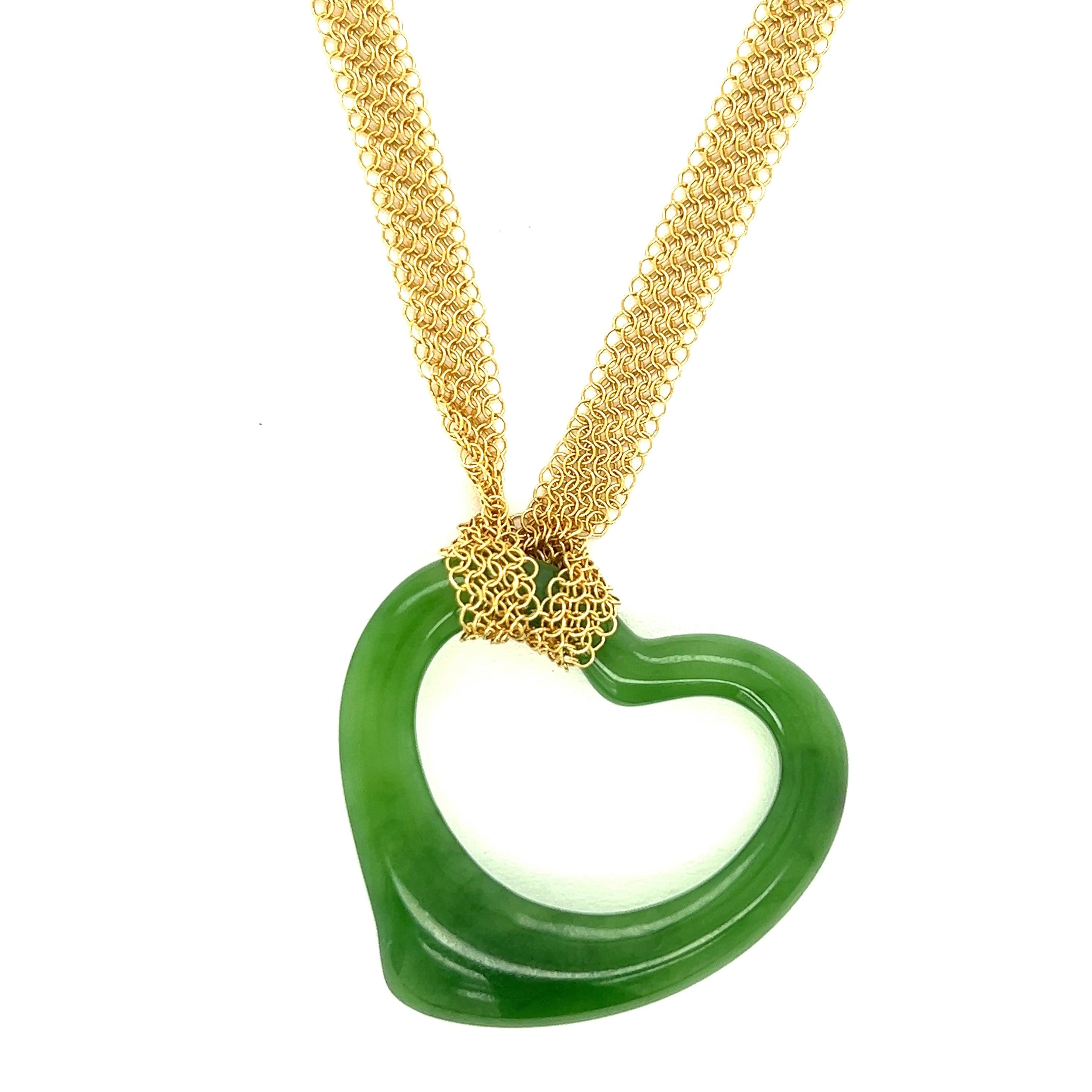 Elsa Peretti for Tiffany & Co. Open Heart Jade Pendant Long Mesh Necklace

Heart shaped jade pendant with long 18 karat yellow gold mesh chain (38 cm); marked T&Co., Au750, Peretti

Pendant size: width 3.5 cm, length 3.3 cm
Total weight: 16.6 grams