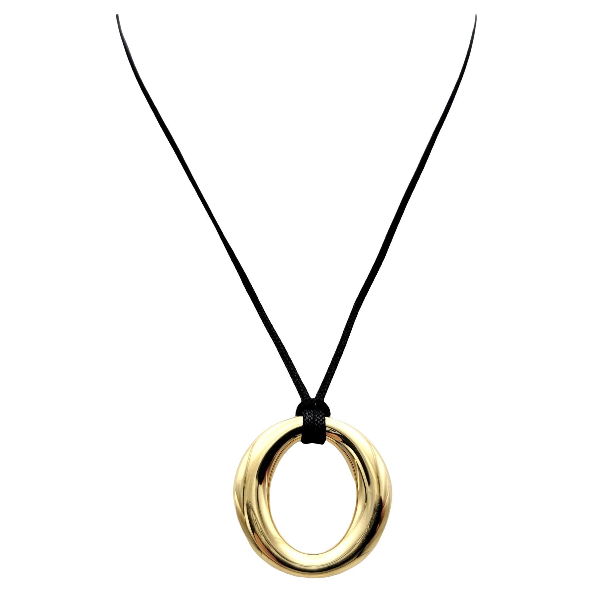 Elsa Peretti® Sevillana™ pendant in 18k gold with a silk cord, small.