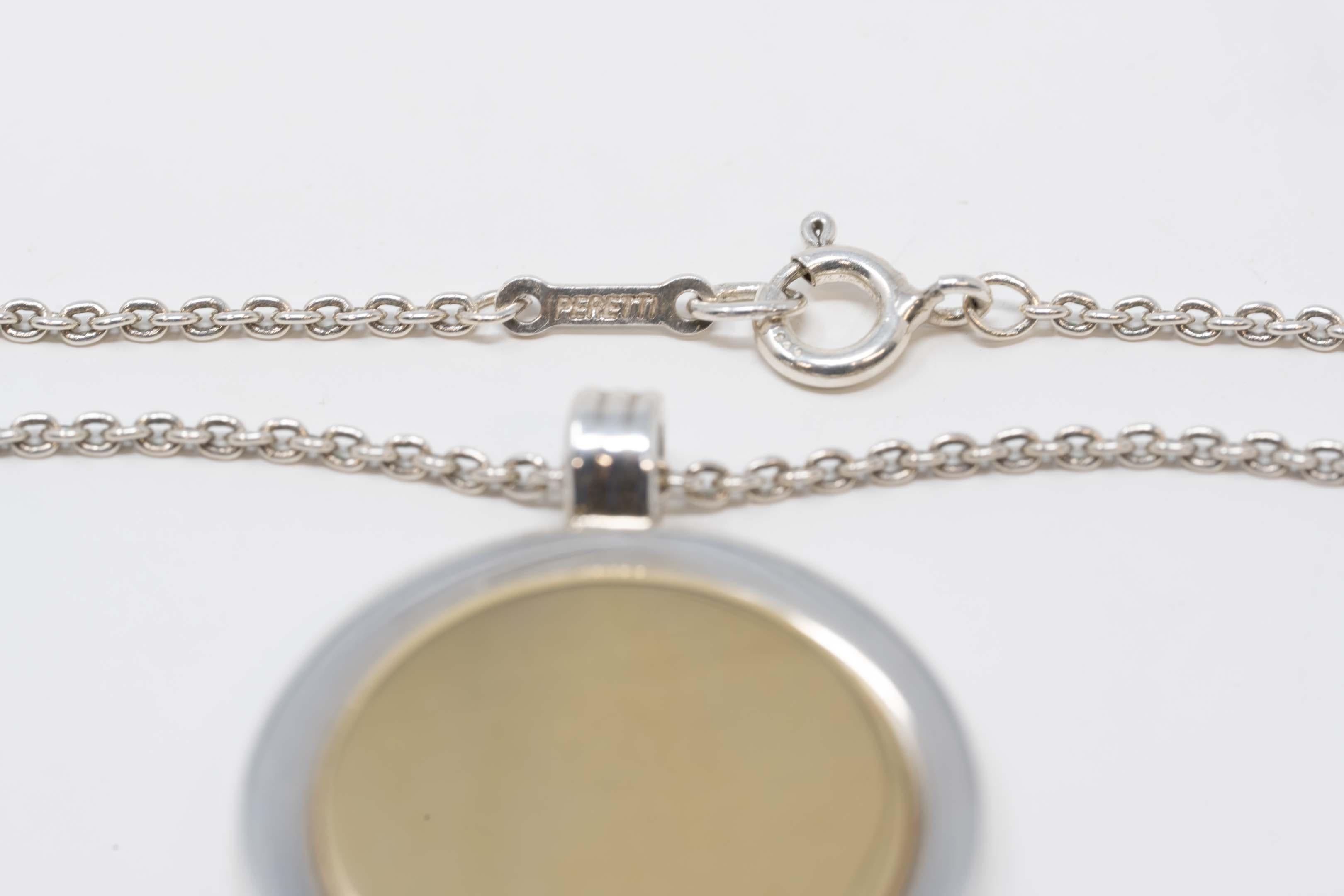 Elsa Peretti for Tiffany & Co Silver Chain & 18k on Silver Round Pendant In Good Condition For Sale In Montreal, QC