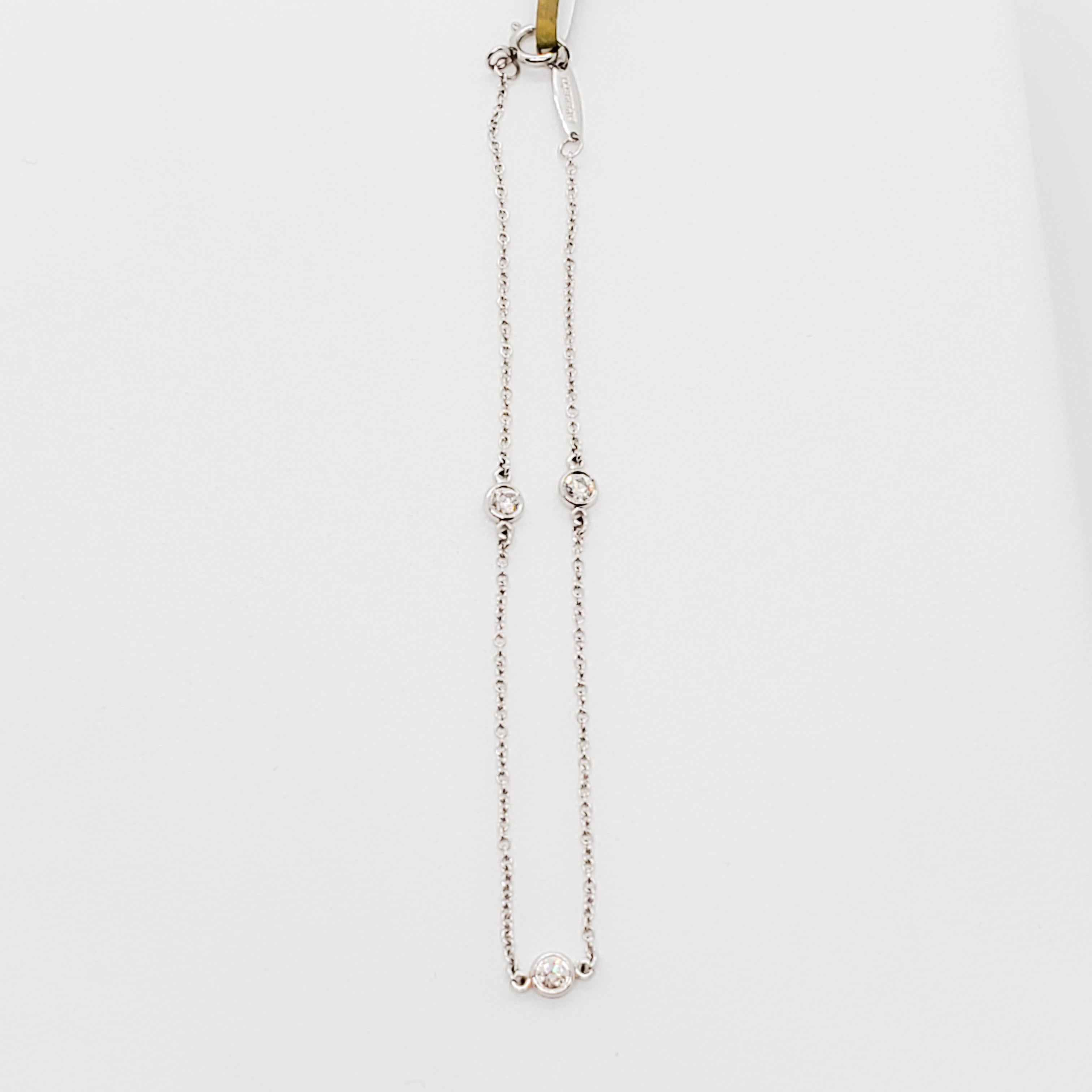 Beautiful estate Elsa Peretti for T&Co bracelet featuring 3 stones in platinum.  Simple and classic, this piece will never go out of fashion.  Length is 7