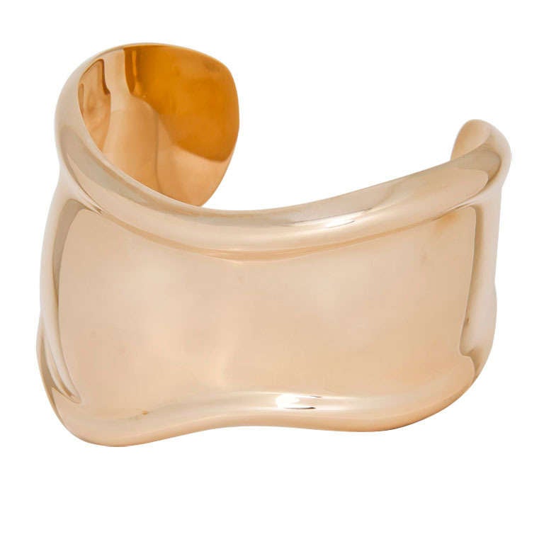 Circa 2000 Elsa Peretti for Tiffany & company 18k Yellow Gold Bone Cuff Bracelet, this is the medium to Large bracelet and measures 1 1/2 inches wide at the widest portion, has a 1 inch opening and an inside wrist measurement of 6 1/2 inches,