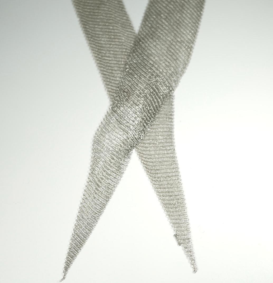 In sterling silver, this mesh scarf necklace by Elsa Peretti for Tiffany & Co. is timeless!  