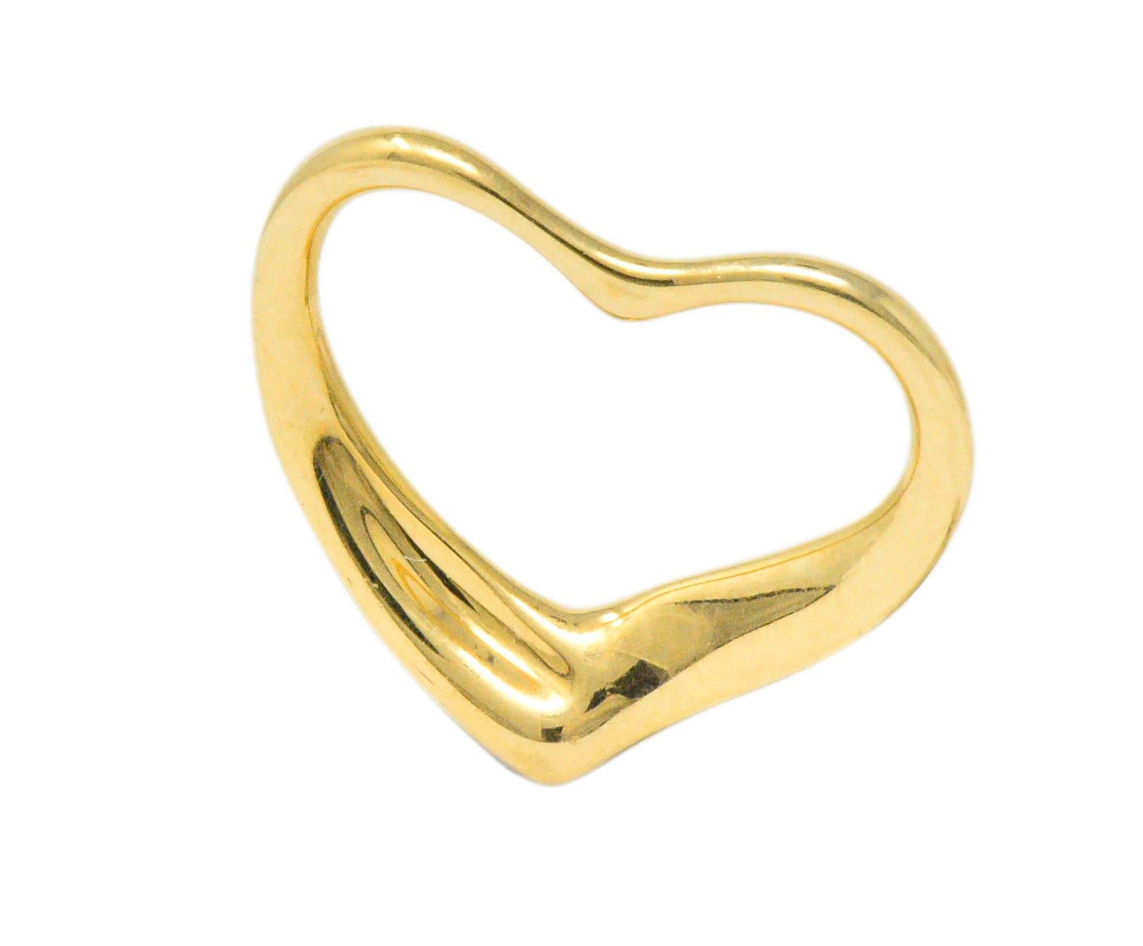 Designed as a high polished gold open heart

Sweet and simple design

Fully signed Tiffany & Co., Peretti

Measuring: 7/8 x 3/4 Inch

Total Weight: 3.2 Grams

Charming. Romantic. Stylish.  
 

 

Stock Number:We- 1798