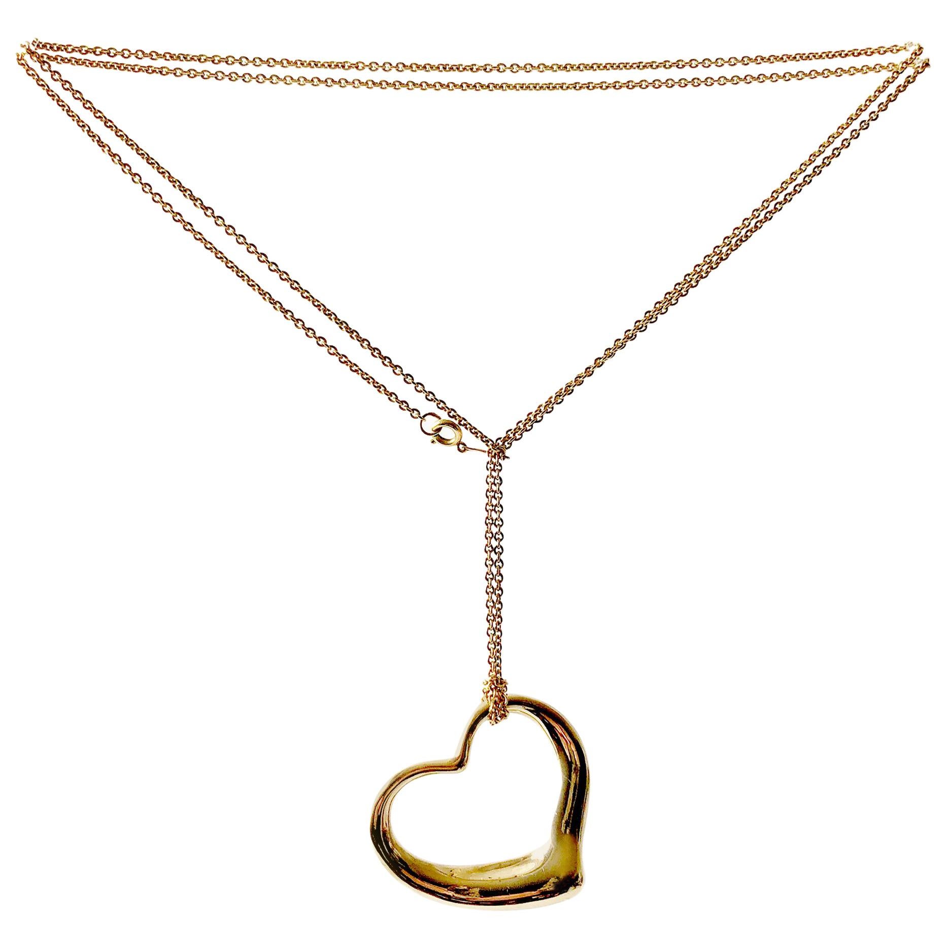 Elsa Peretti Tiffany 
Co. 18 Karat Gold Large Floating Heart Pendant Necklace