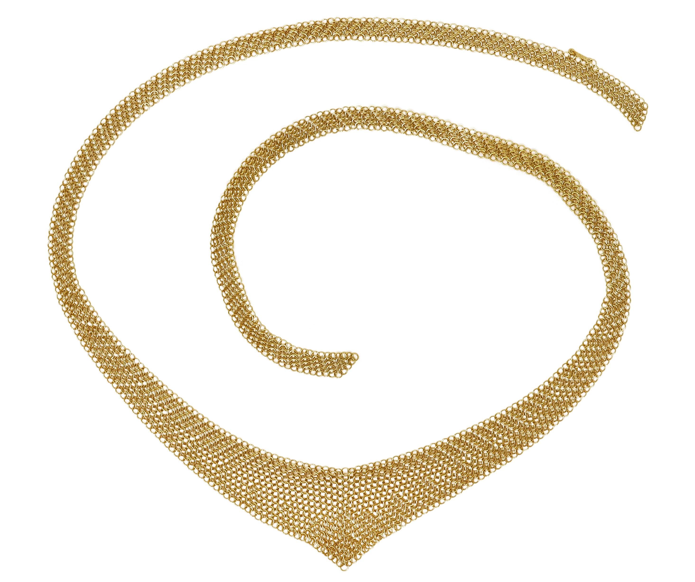 Scarf style necklace is designed as gold chainmail in a pointed chevron motif

Completely comprised of small intersecting gold jump rings with a bright finish

No clasp, meant to be tied like a scarf

With logo link signed T&Co. and Peretti

Stamped