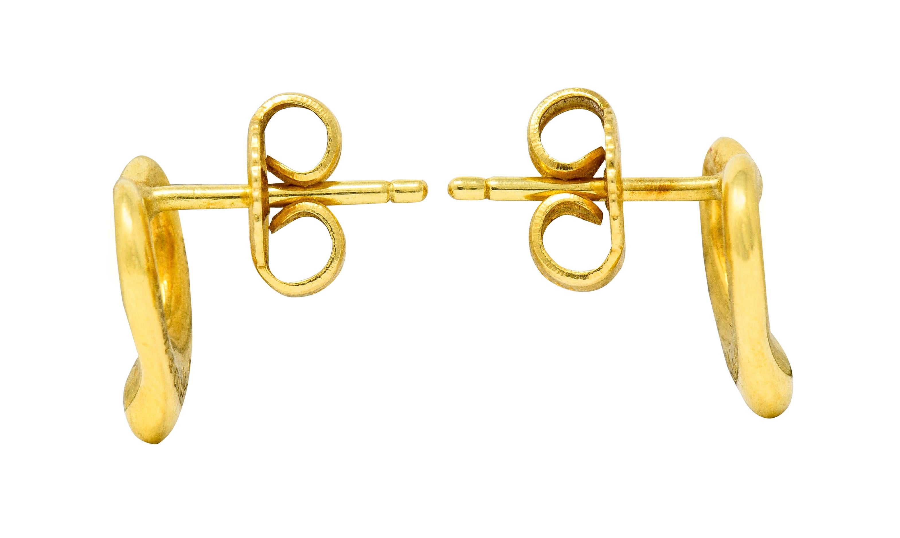 Stud style earrings designed as a polished gold open heart motif

Completed by posts and friction backs

Both fully signed Tiffany & Co. Elsa Peretti Spain

Both stamped 750 for 18 karat gold

Measures: 10.4 x 10.7 mm

Total weight: 2.8