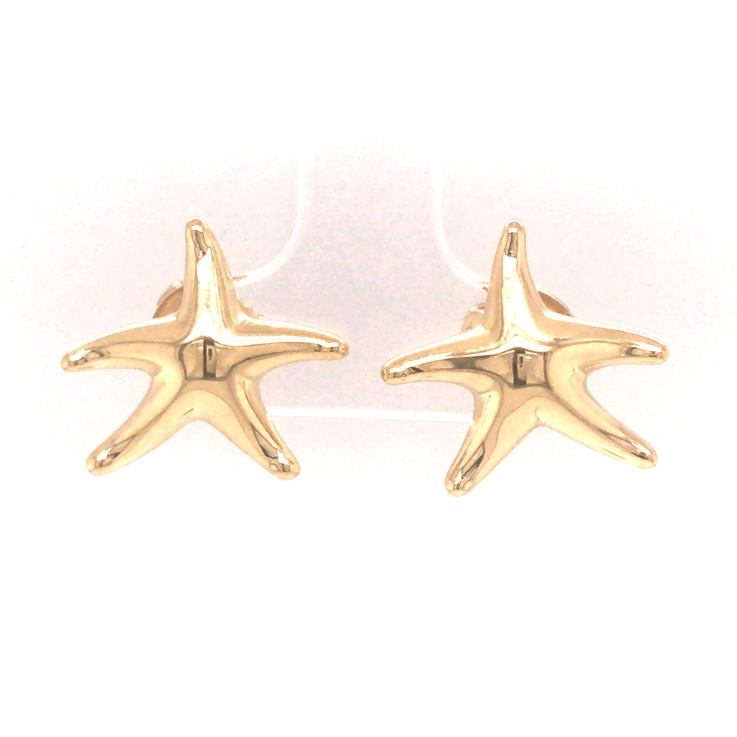 Elsa Peretti Tiffany & Co. 18K Yellow Gold Starfish Stud Earrings.  The Earrings measure 5/8 inch in length and width.  Stamped Elsa Peretti Tiffany & Co 750 Spain (c).  5.59 grams.  Tiffany & Co. Velvet Bag and Box included