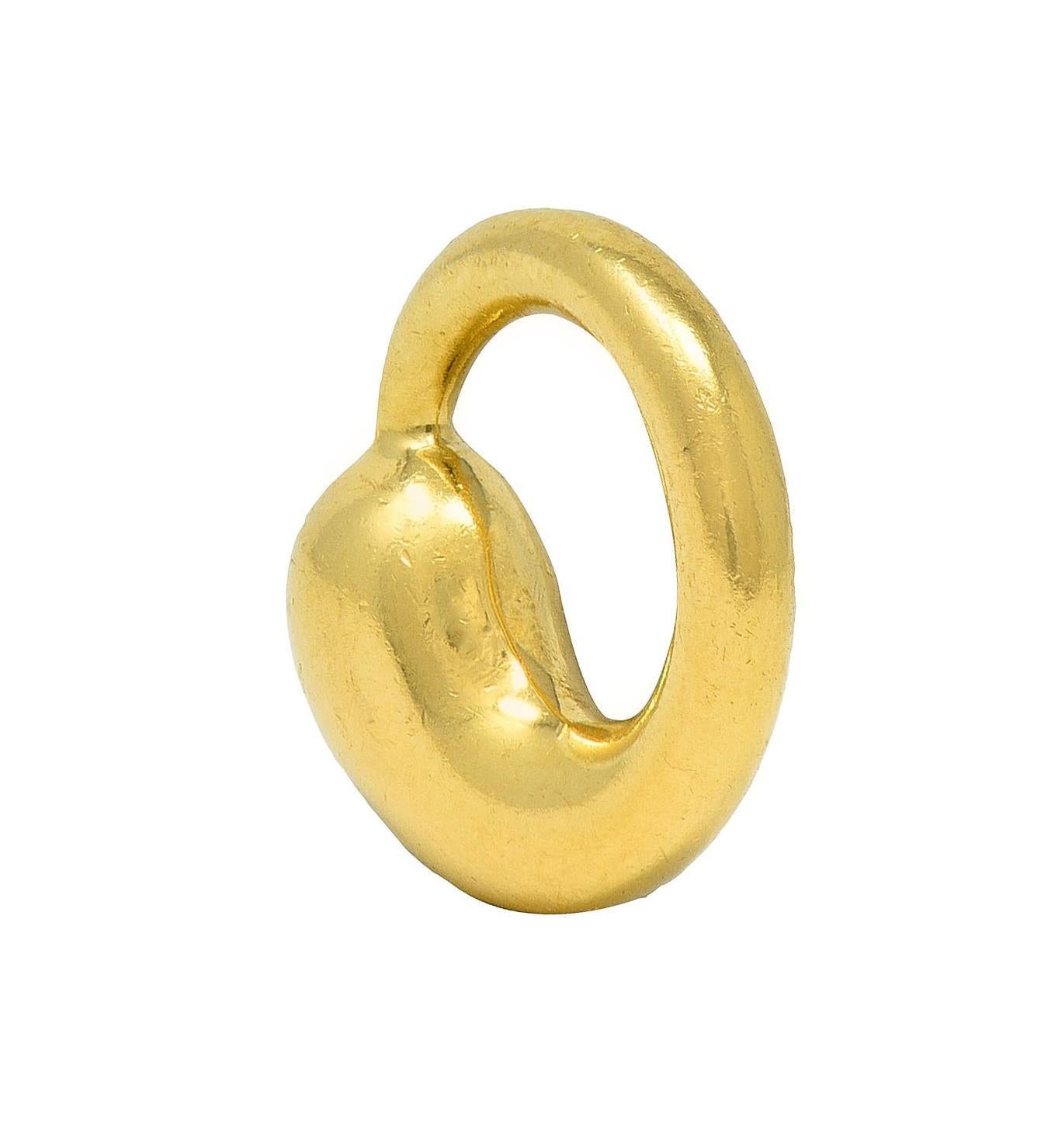 Designed as a teardrop form with tapered tail forming a circle
With a high polish gold finish
Stamped for 18 karat gold, Spain
Fully signed for Elsa Peretti for Tiffany & Co.
Circa: 1990s; via the Eternal Circle collection
Measures: 1/2 x 1/2