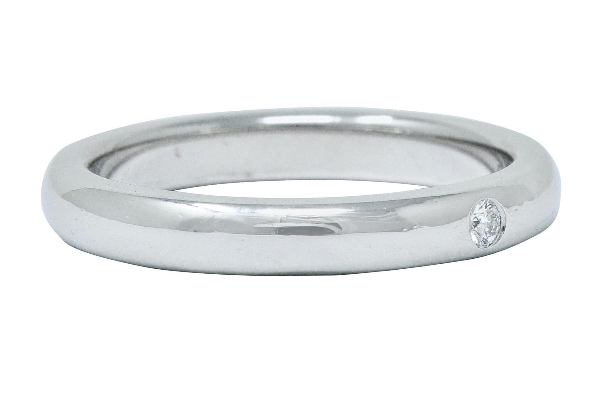 Designed as a polished band with a rounded curvature

Featuring a flush set round brilliant cut diamond

Weighing approximately 0.03 carat; eye-clean and white

Signed Peretti and Tiffany & Co.

Stamped PT950 for platinum

Circa: 1990s

Ring Size: 4