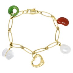 Elsa Peretti Tiffany & Co. Jade Agate Crystal 18 Karat Gold Five Charm Bracelet