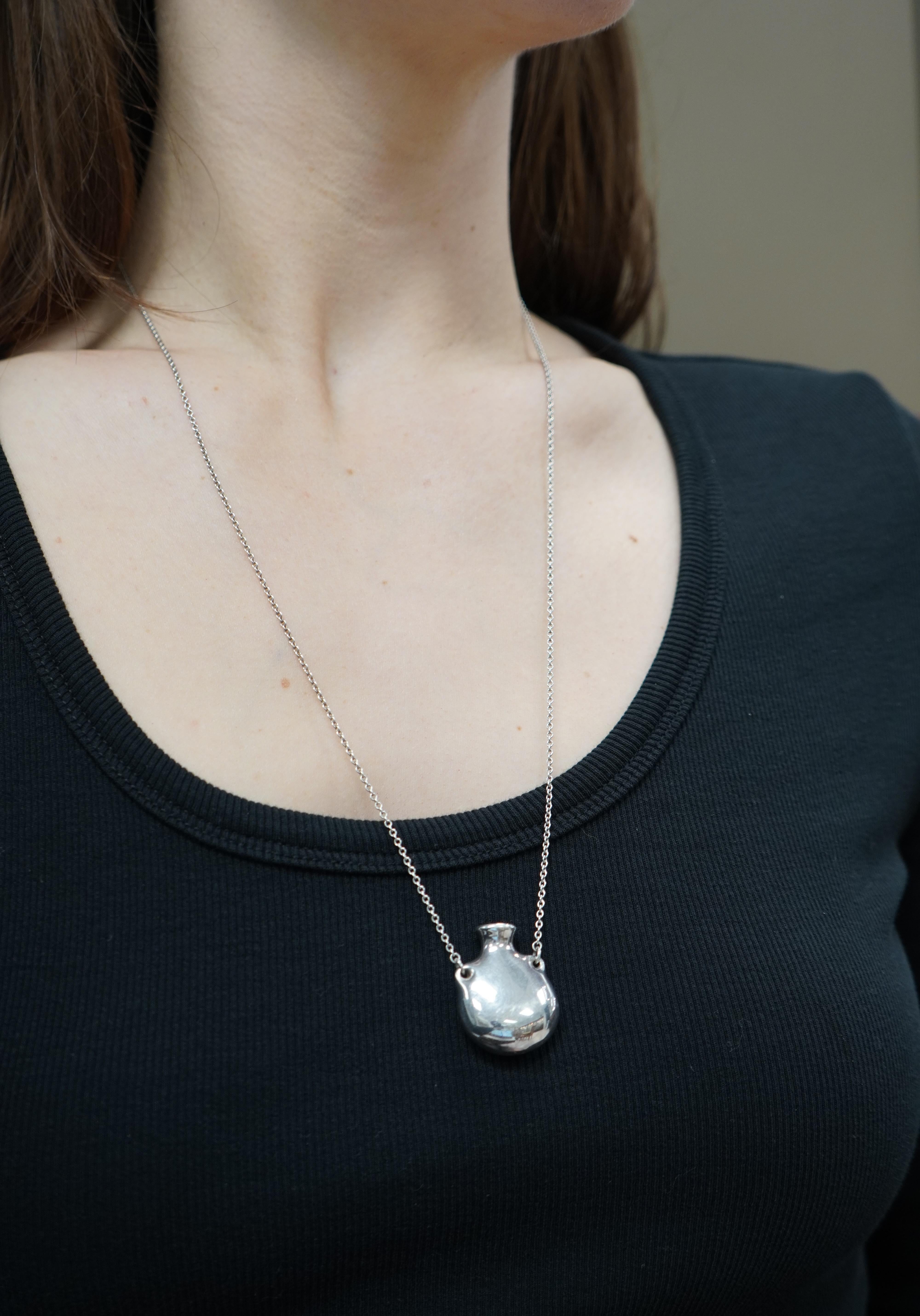 One of Elsa Peretti's first jewelry designs. Pendant in sterling silver. Size small, on a 24