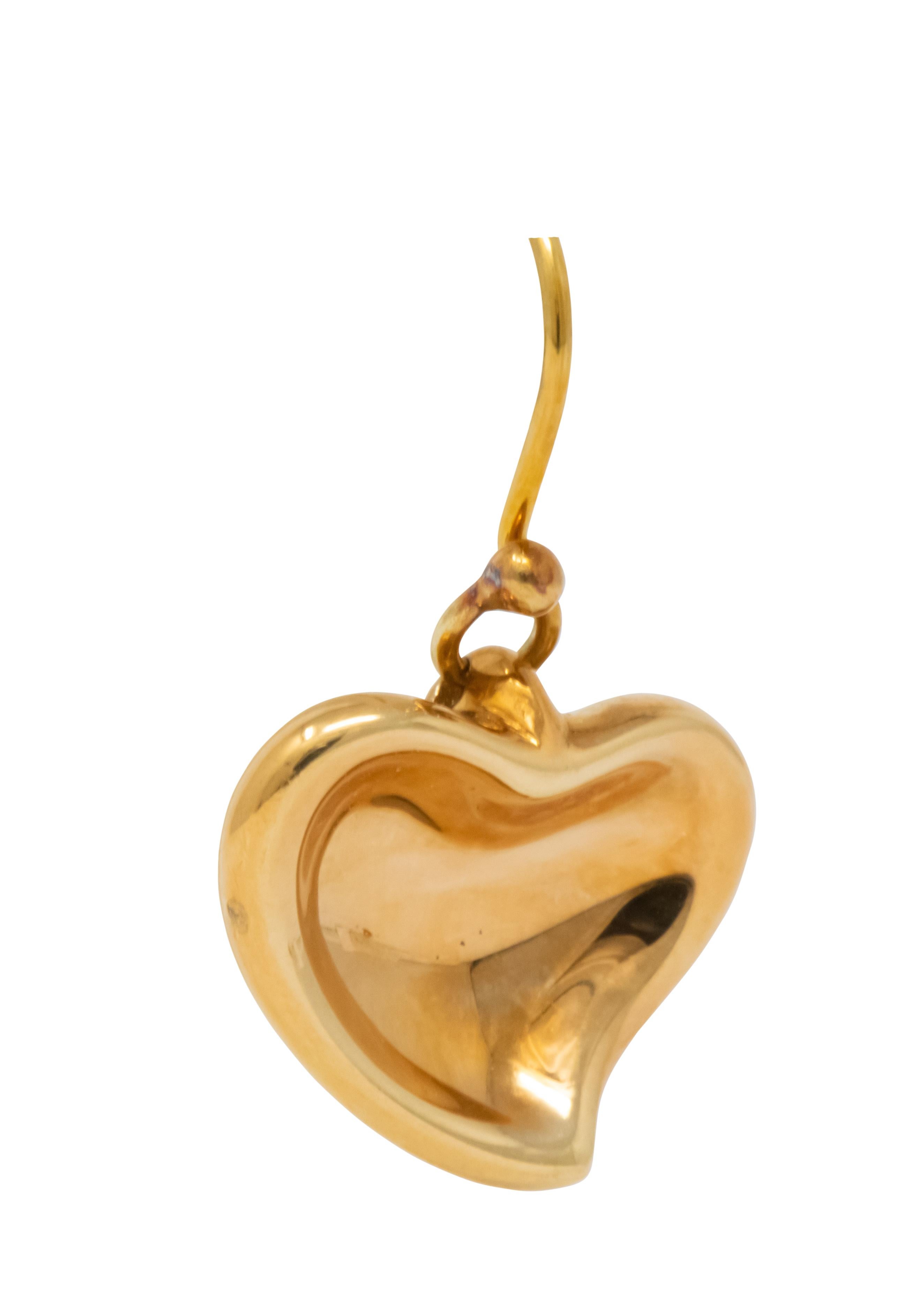 Each earring features a high polished gold abstract heart drop

With French hooks

Fully signed Elsa Peretti Tiffany & Co.

Stamped 750 and Spain

Measures: 1 x 9/16 inch

Total Weight: 9.5 grams

Dainty. Splendid. Mod.

Stock Number: We-2726