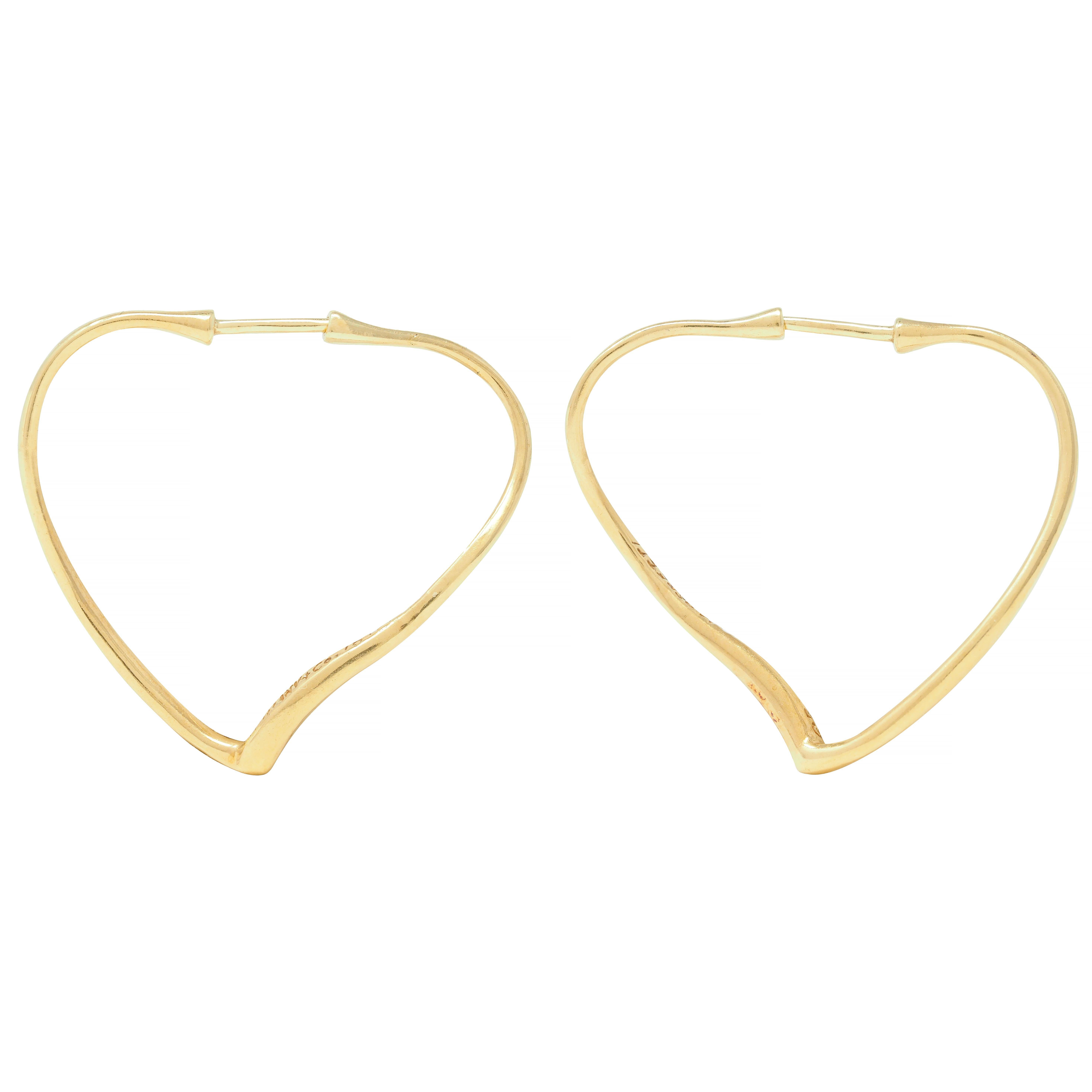 Elsa Peretti Tiffany & Co. Vintage 18 Karat Yellow Gold Open Heart Hoop Earrings In Excellent Condition For Sale In Philadelphia, PA