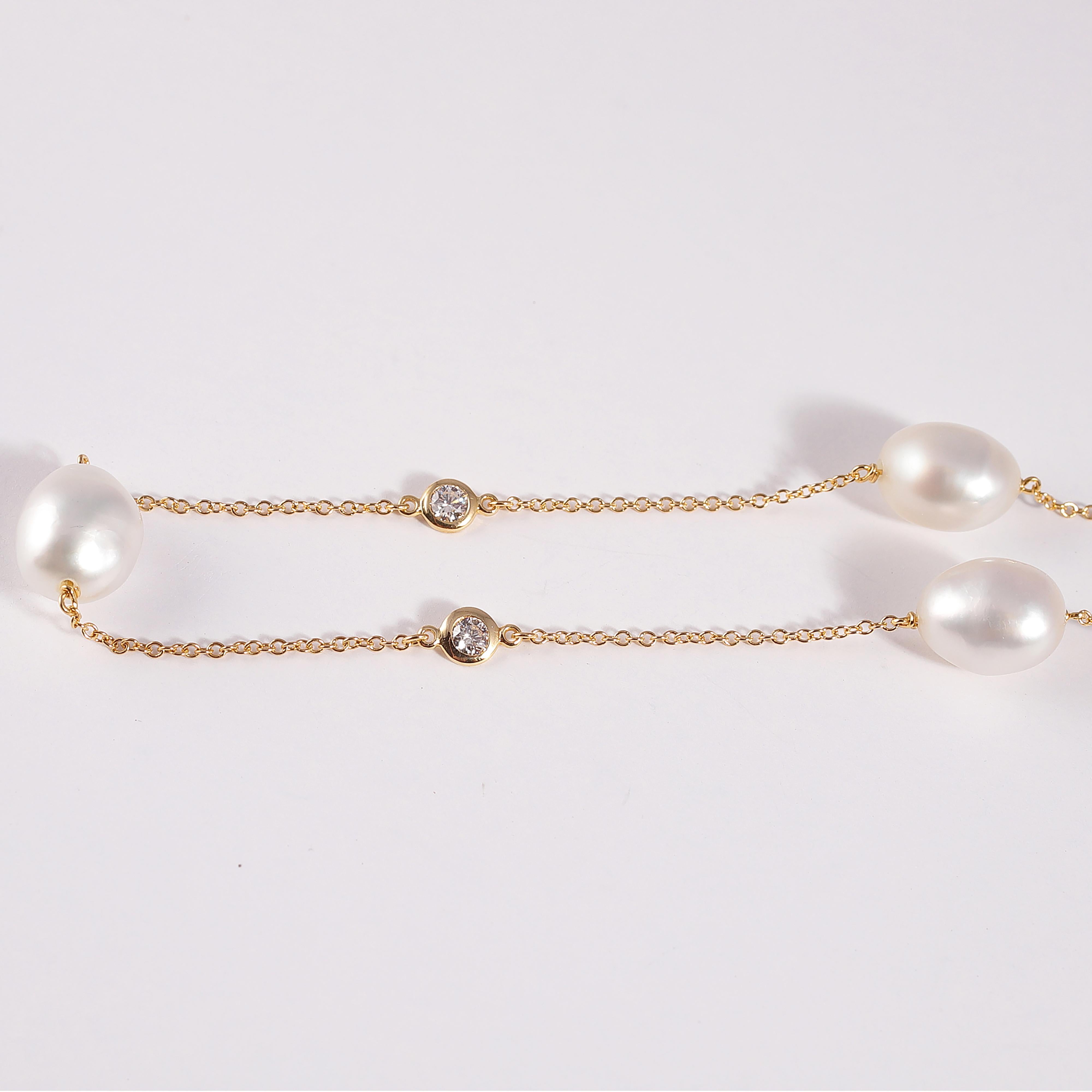 From famed designer Elsa Peretti for Tiffany & Co. this classic necklace features three Keshi pearls alternating with six bezel-set, found brilliant diamonds.