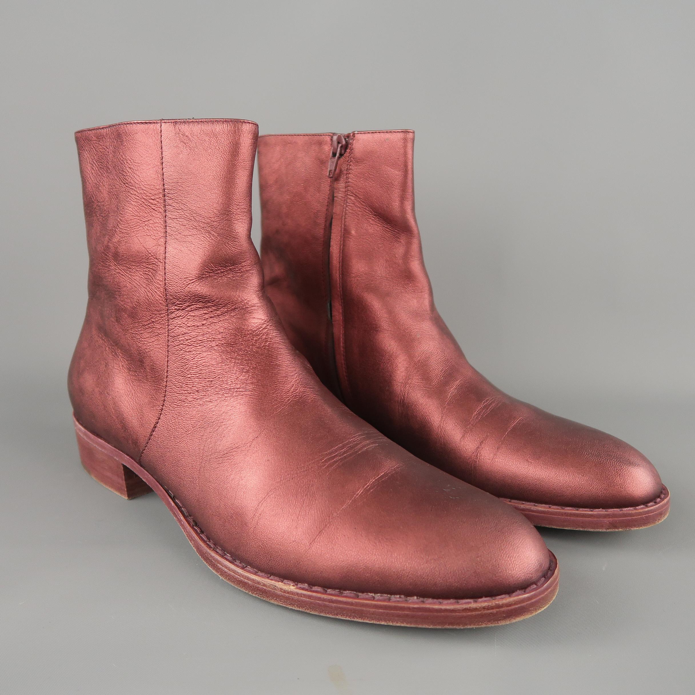 ELSA ankle boots come in burgundy metallic leather with a colored sole and inner zip closure. With Box. Made in Italy.
 
Excellent Pre-Owned Condition.
Marked: IT 43.5
 
Measurements:
 
Length:12 in.
Width: 4.24 in.
Height: 7 in.
Heel: 1.25 in.