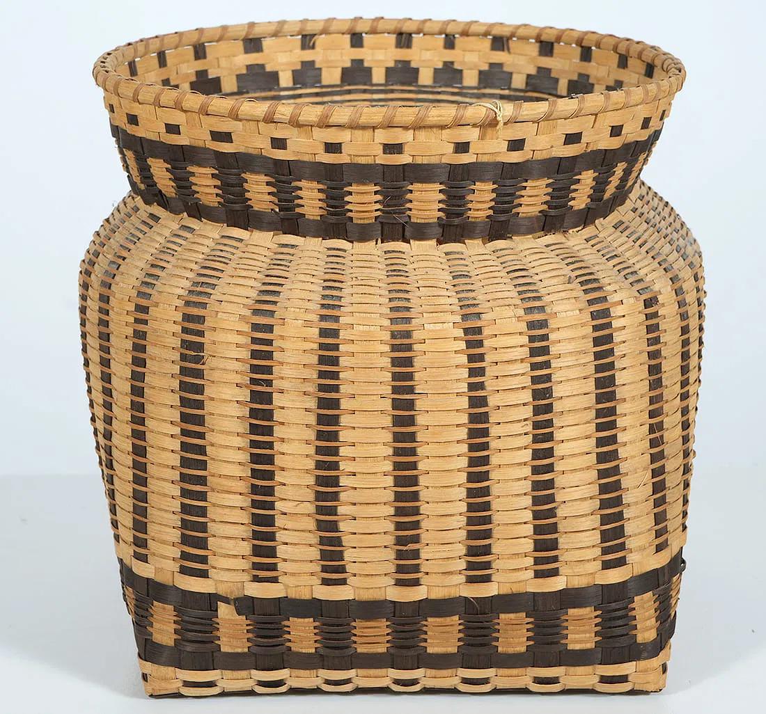 Elsie Watty Native American Hand-woven Crafted Basket, White Oak

Offered for sale is a Native American Woven Basket by Elsie Watty. The basket is White Oak Basket with checkerboard weave and walnut and blood root dyes, includes label from Certified