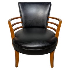 El exclusivo sillón Art Déco con brazos en forma de barril, diseñado por Gilbert Rohde para Herman Miller, década de 1930