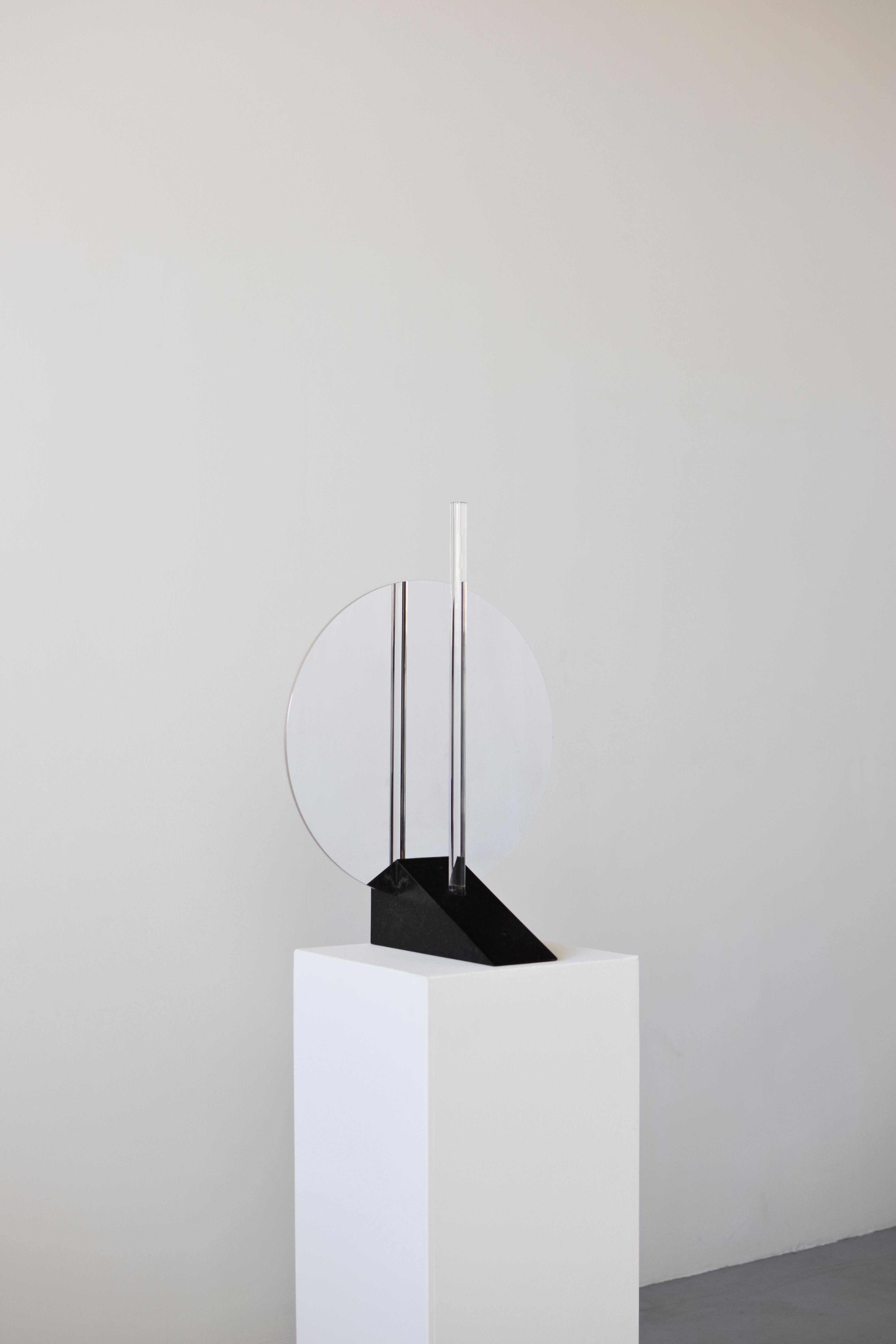 Sculptural table lamp - Maximilian Michaelis

Title: The elusive nature of perception, No. 02

Measures: ca. 39 x 55 x 27 cm

Material: polished stainless steel, Belgian bluestone, acrylic glass, Led

The basis and inspiration for Maximilian
