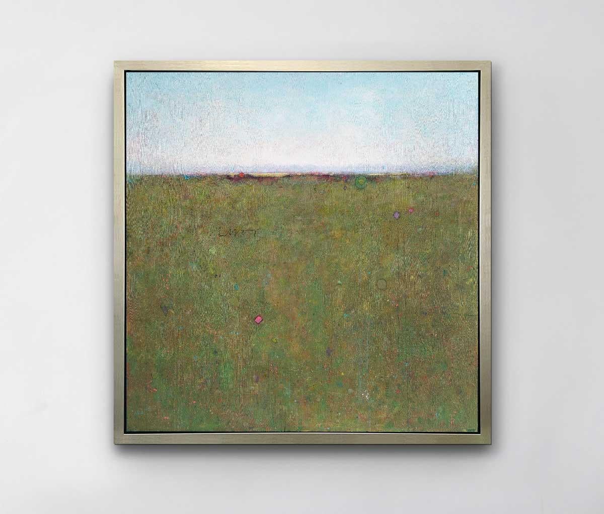 This limited edition print is an abstract landscape by Elwood Howell. Below a high horizon line, a blend of earth colors are layered together with specks of colorful shapes throughout. Above the line, lavender and white fade to light blue up at the