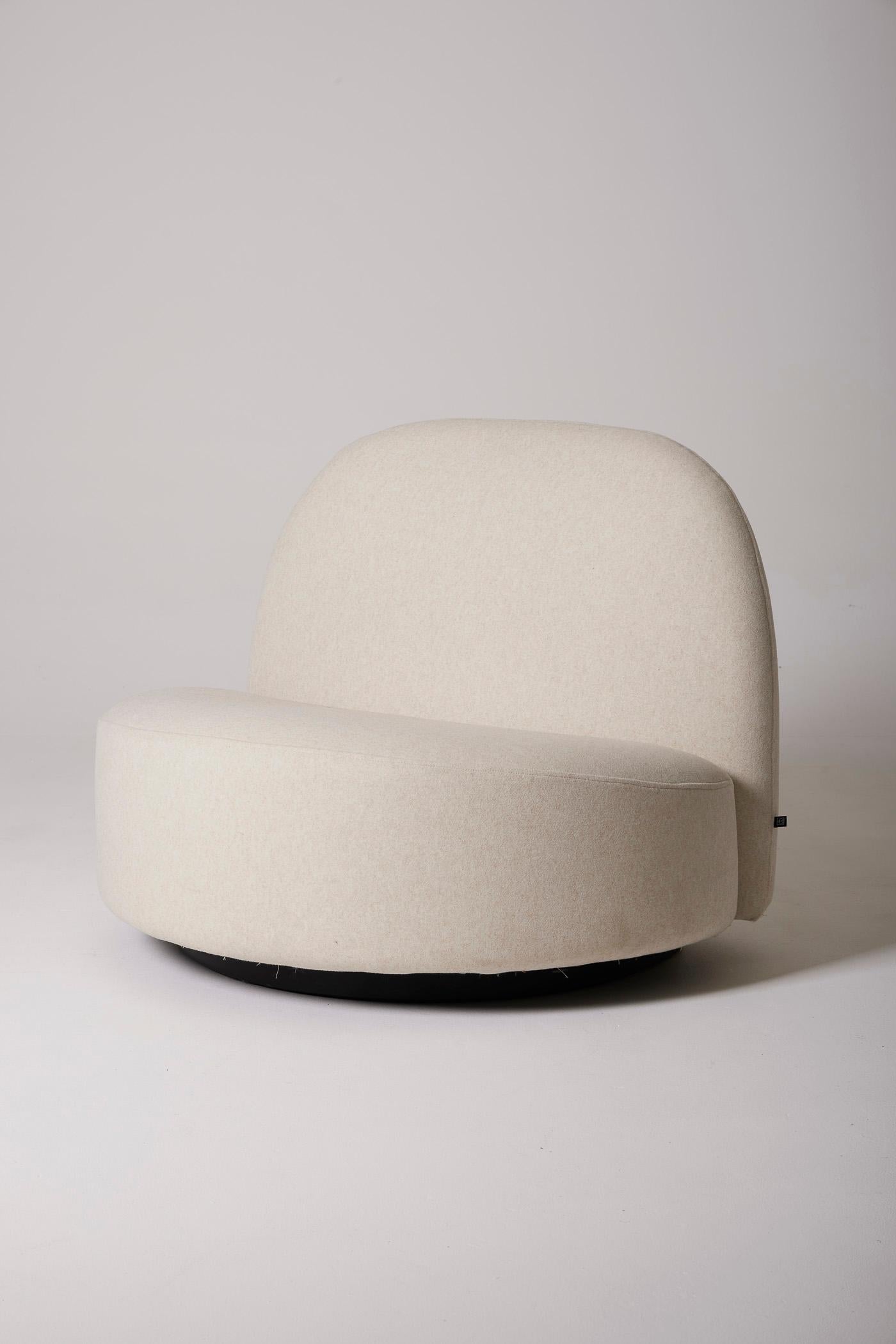 Armchair from the Elysée collection by French designer Pierre Paulin, 1970s. This 'Elysée' collection was created in 1969 to commemorate the arrival of Georges Pompidou at the Elysée Palace. The armchair has been reupholstered in a cream fabric. In