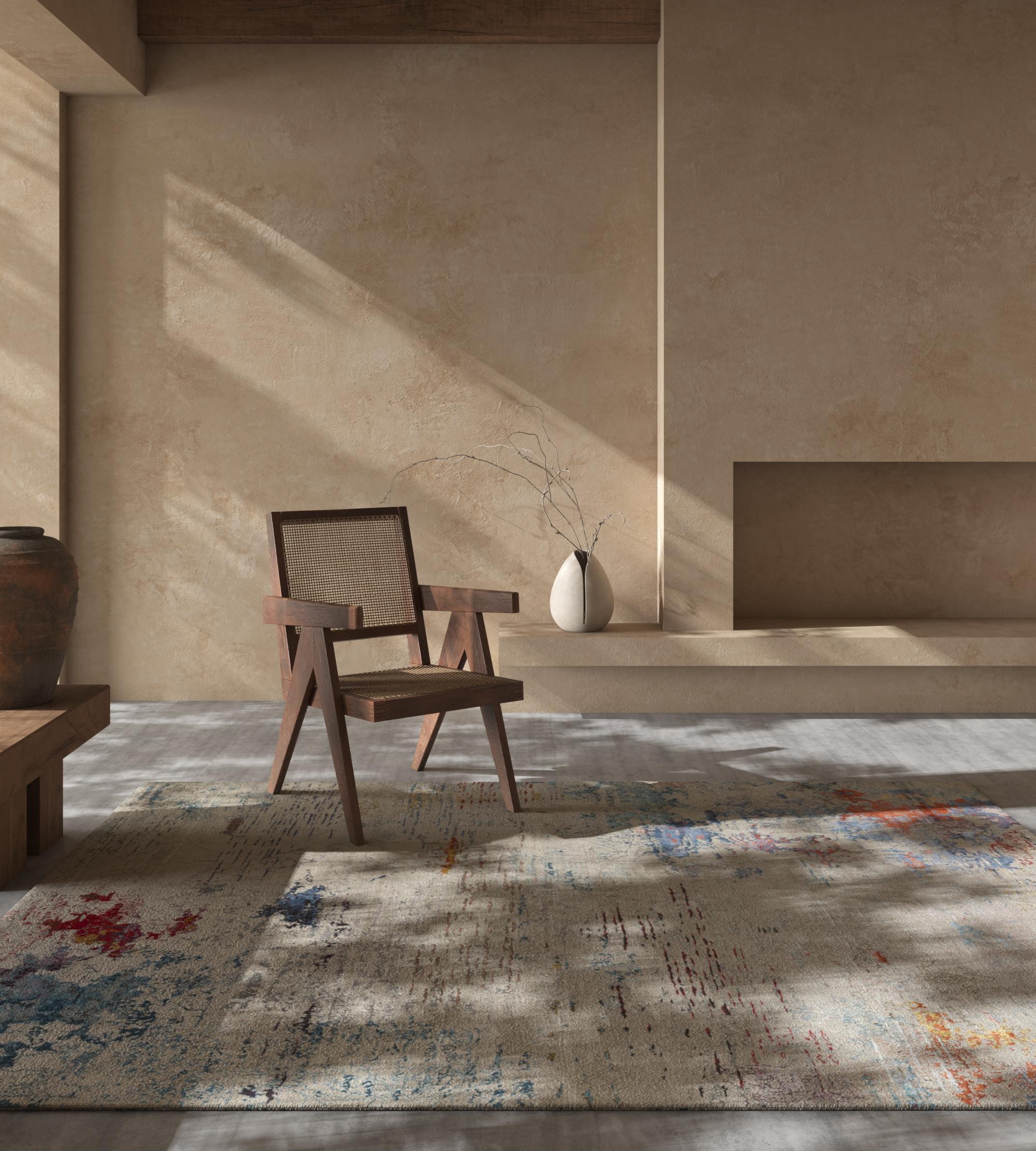 Le design complexe de ce superbe tapis de la collection Unstring by Kavi présente un mélange de blanc antique et de teintes sarcelles profondes, créant un impact visuel saisissant qui attire instantanément le regard. Fabriqué à la main selon des