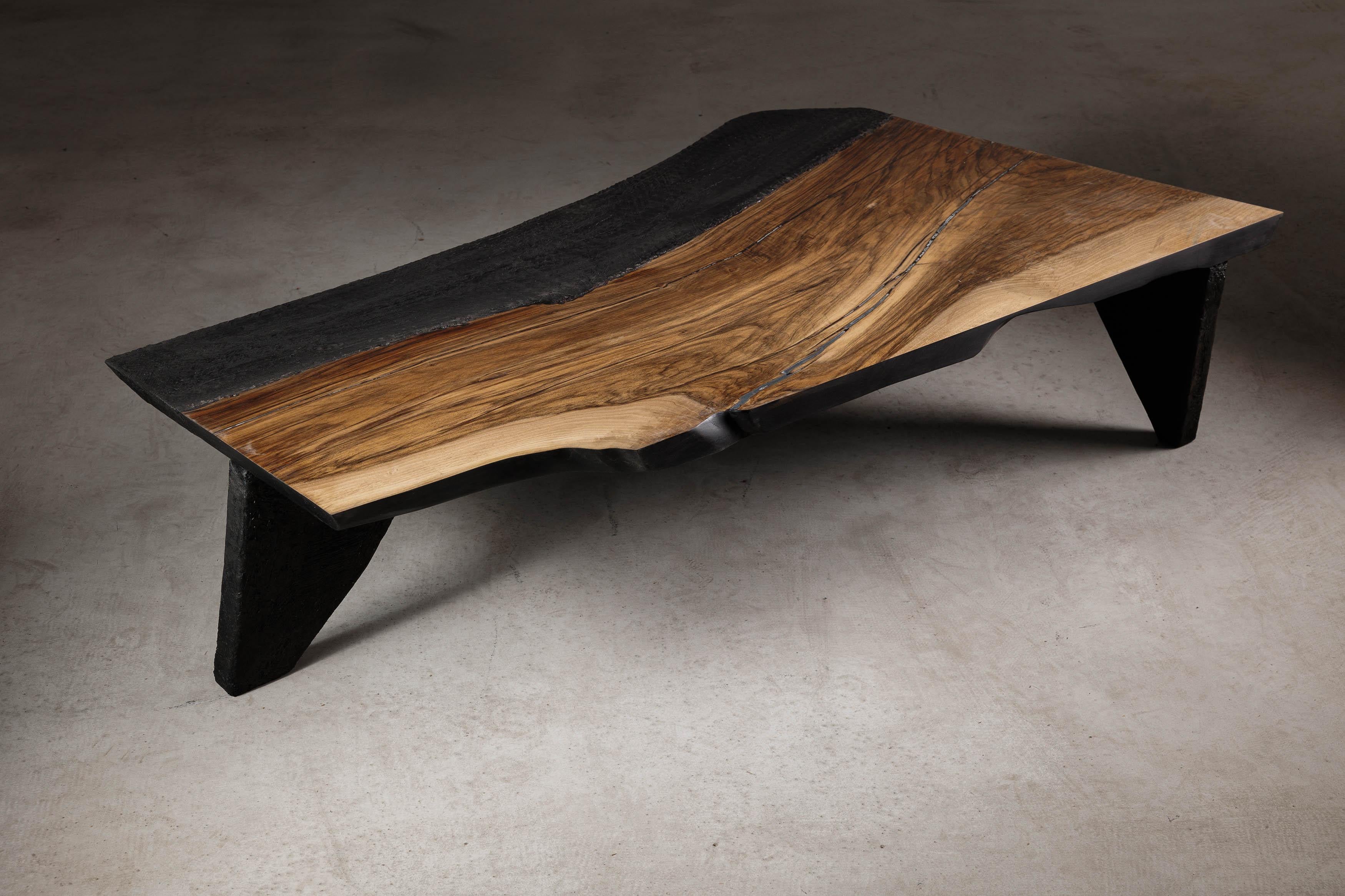 EM106 coffee table by Eero Moss
One of a kind
Dimensions; W 145 x D 87 x H 35 cm
Materials: Walnut, charred ash, fiberglass, acrylic resin, India ink.
Finish: Natural oils.

18 Brut Collection

The latest collection by the artist is a