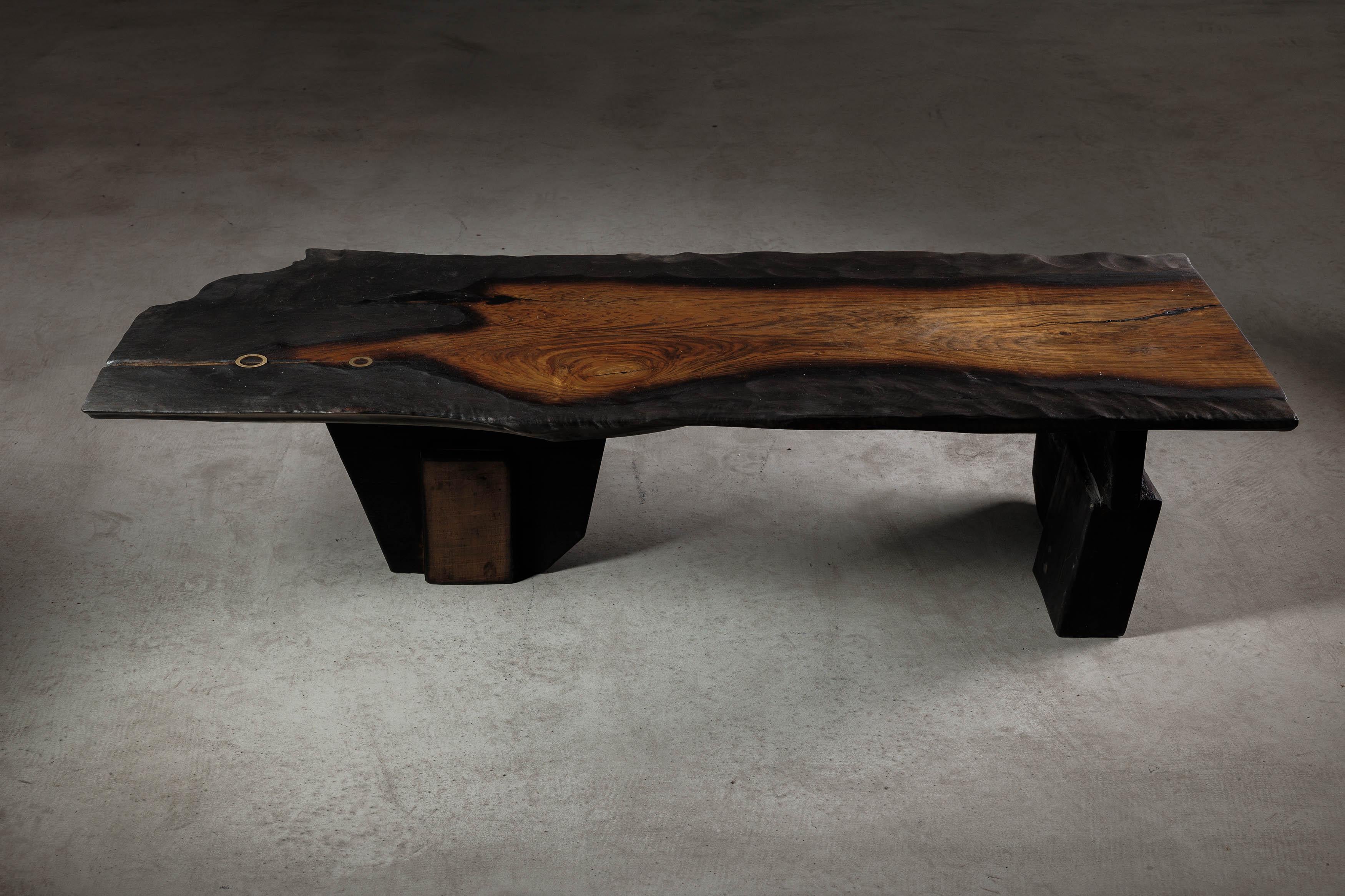 EM107 coffee table by Eero Moss
One of a kind
Dimensions; W 145 x D 55 x H 36 cm
Materials: Walnut, charred ash, India ink.
Finish: Natural oils.

18 Brut Collection

The latest collection by the artist is a tribute to the brutalist