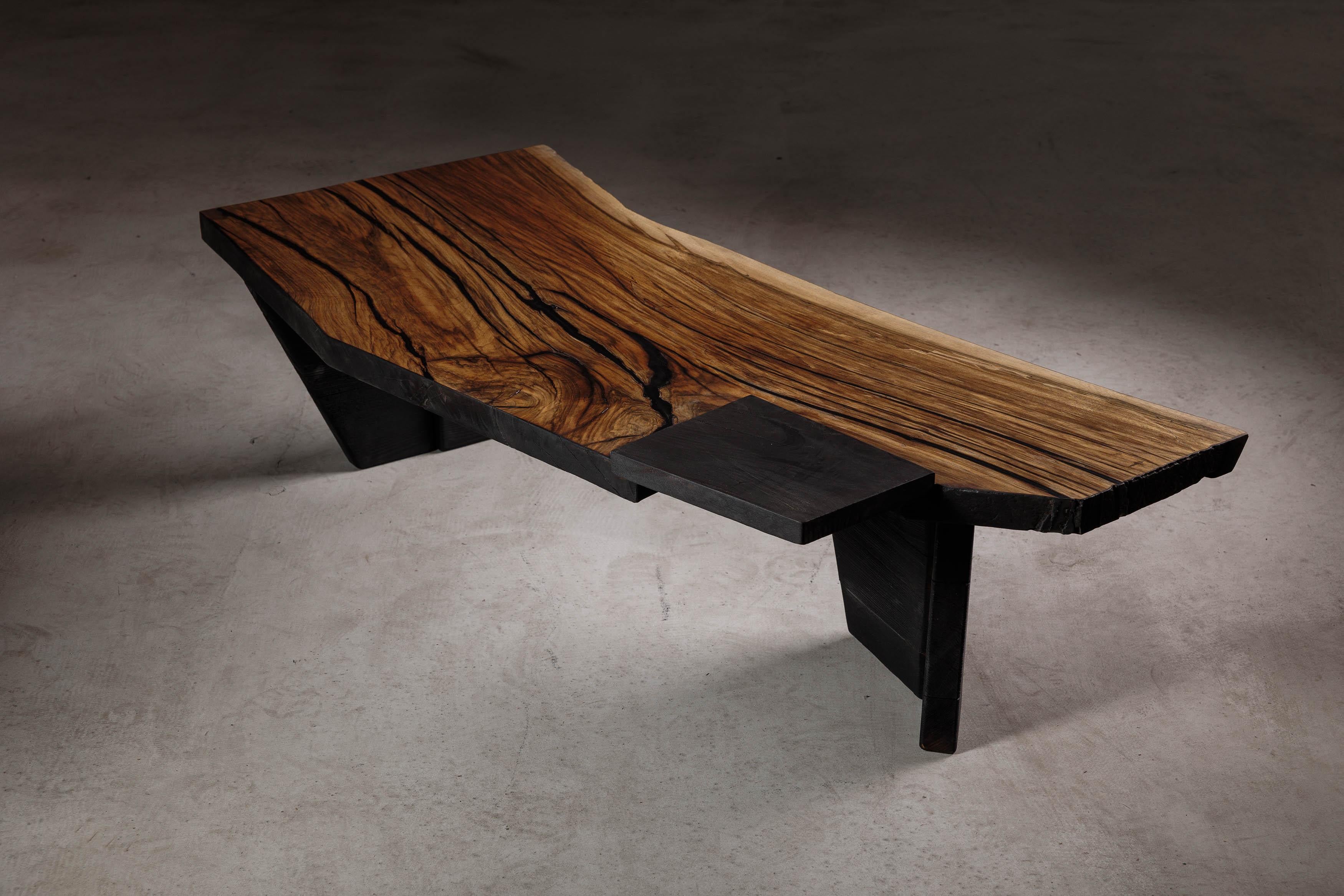 EM108 coffee table by Eero Moss
One of a kind
Dimensions; W 136 x D 58 x H 35 cm
Materials: Walnut, charred ash, India ink.
Finish: Natural oils.

18 Brut Collection

The latest collection by the artist is a tribute to the brutalist