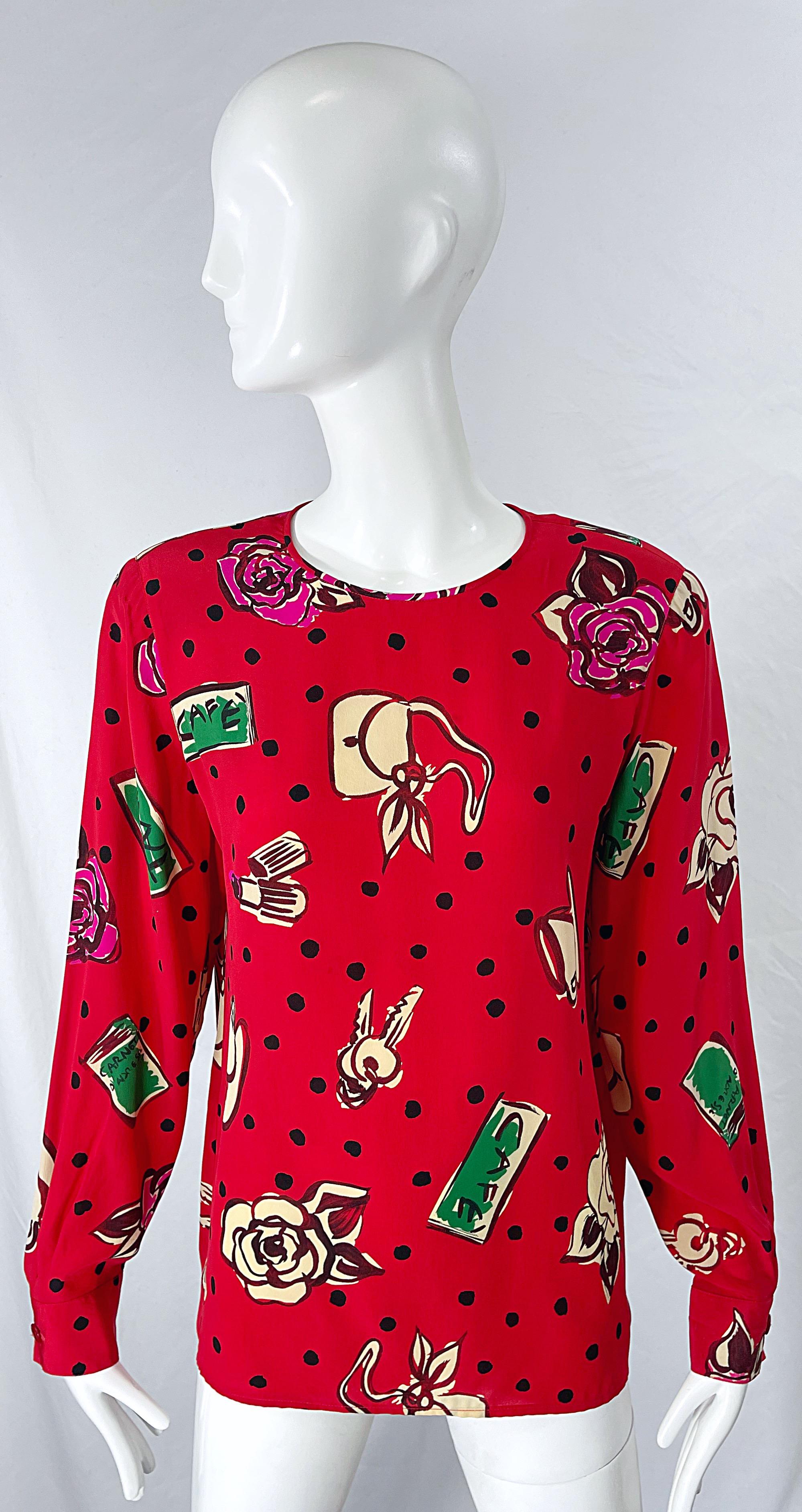 Chic mid 90s EMANUEL UNGARO lipstick red vintage silk novelty blouse ! Features prints of handbags, keys, lipstick, roses, coffee cups, cafe, and polka dots throughout. Buttons up the top back center neck. Can easily be dressed up or down, sleeves