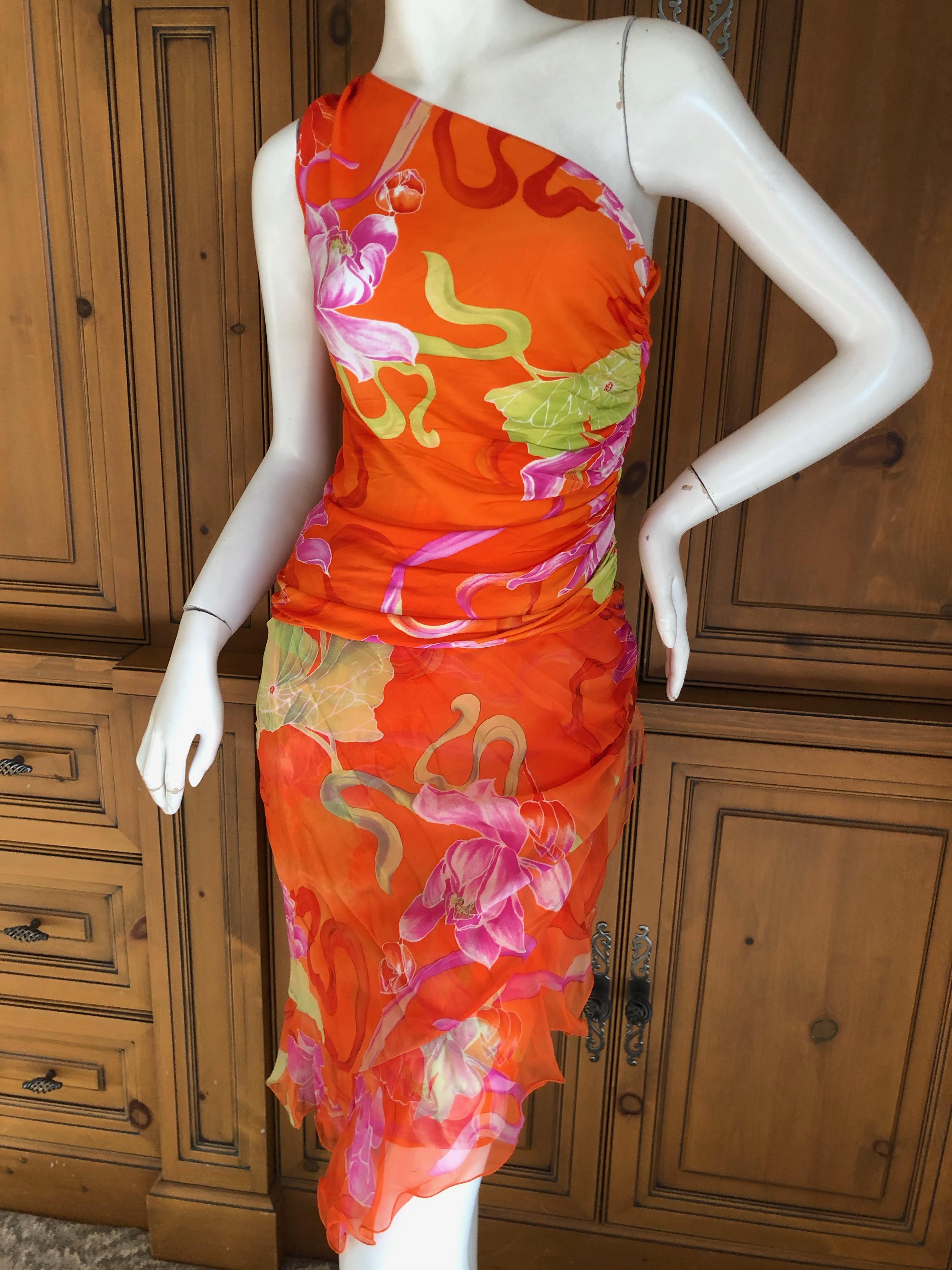 Emanuel Ungaro 3 Piece Silk Floral One Shoulder Dress w Shawl by Peter Dundas.
Featuring a flounced skirt with side zipper, one shoulder top, and matching shawl.
Size 38
Bust 36