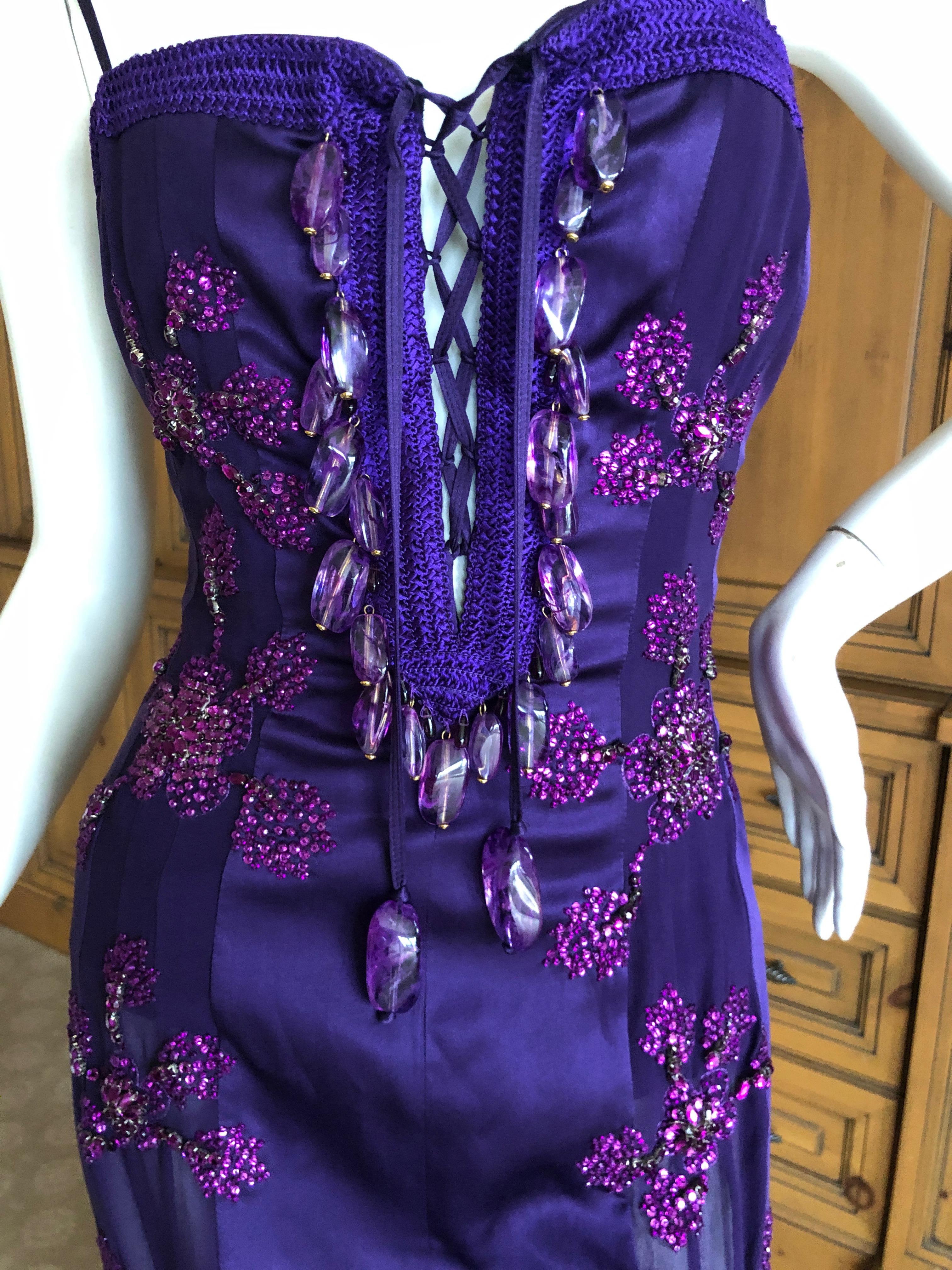 Emanuel Ungaro Amethyst Embellished Vintage Silk Evening Dress by Peter Dundas.
This is such a charming piece, please use the zoom feature to see the bead details.
There is no size tag, I would estimate it to be size 42 Fr

Bust  36