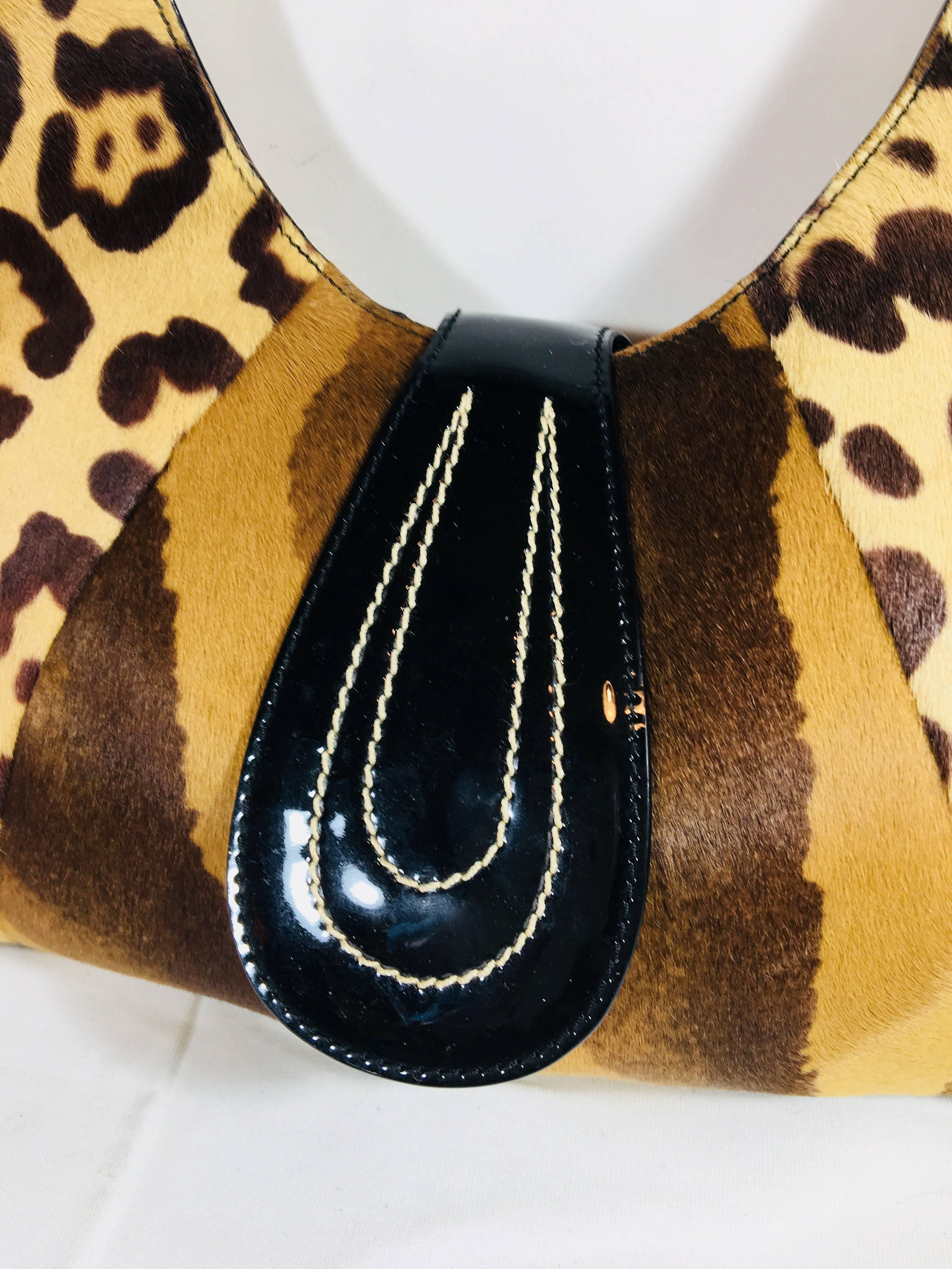 Emanuel Ungaro Animal Print Hobo Bag. Medium Sized Made of Pony Hair with Patent Leather Trim and Magnetic Closure.