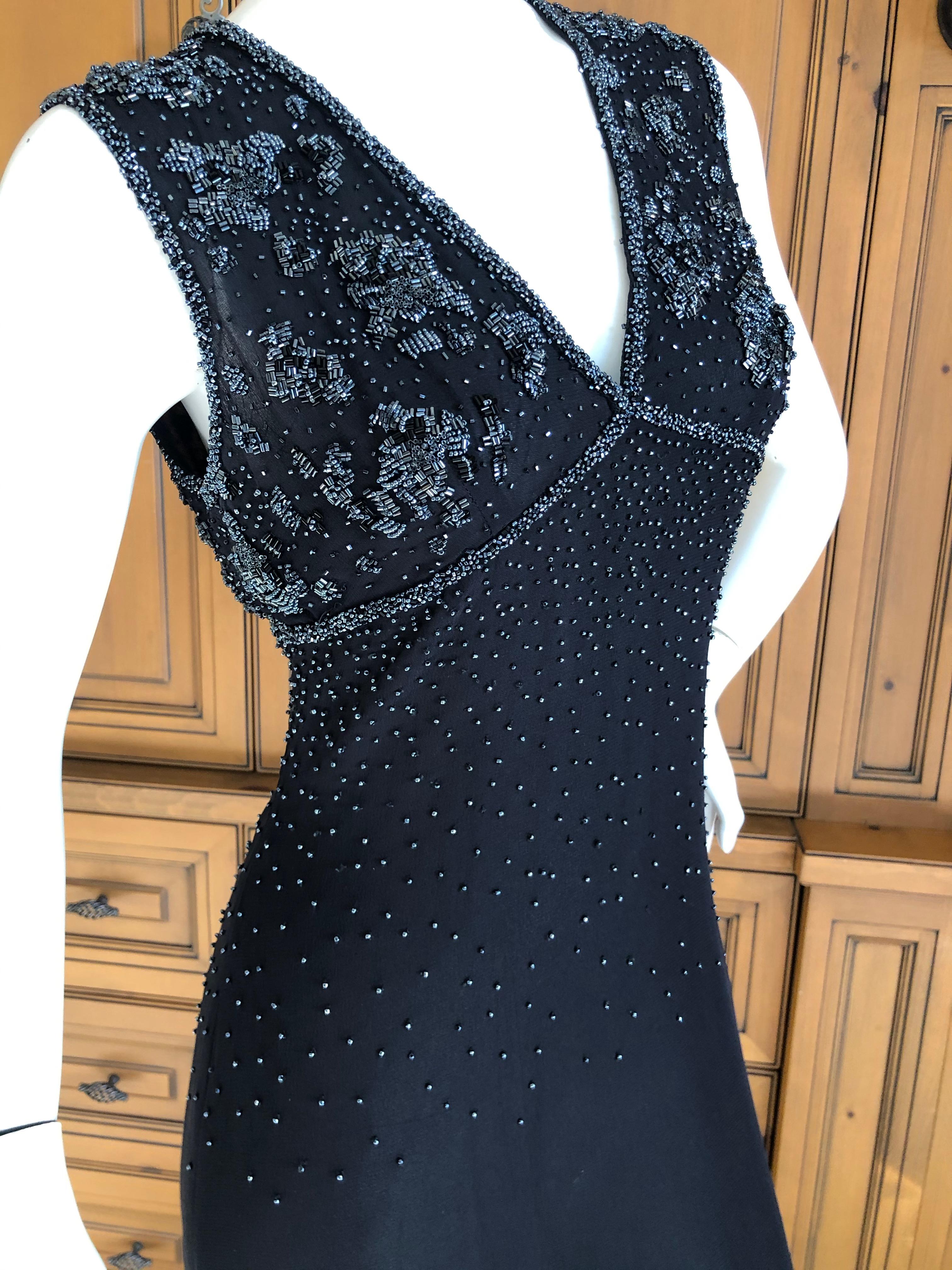 Emanuel Ungaro Parallel Vintage Black Evening Dress w Hematite Seed Bead Details
So pretty .
Size 6
Bust 35