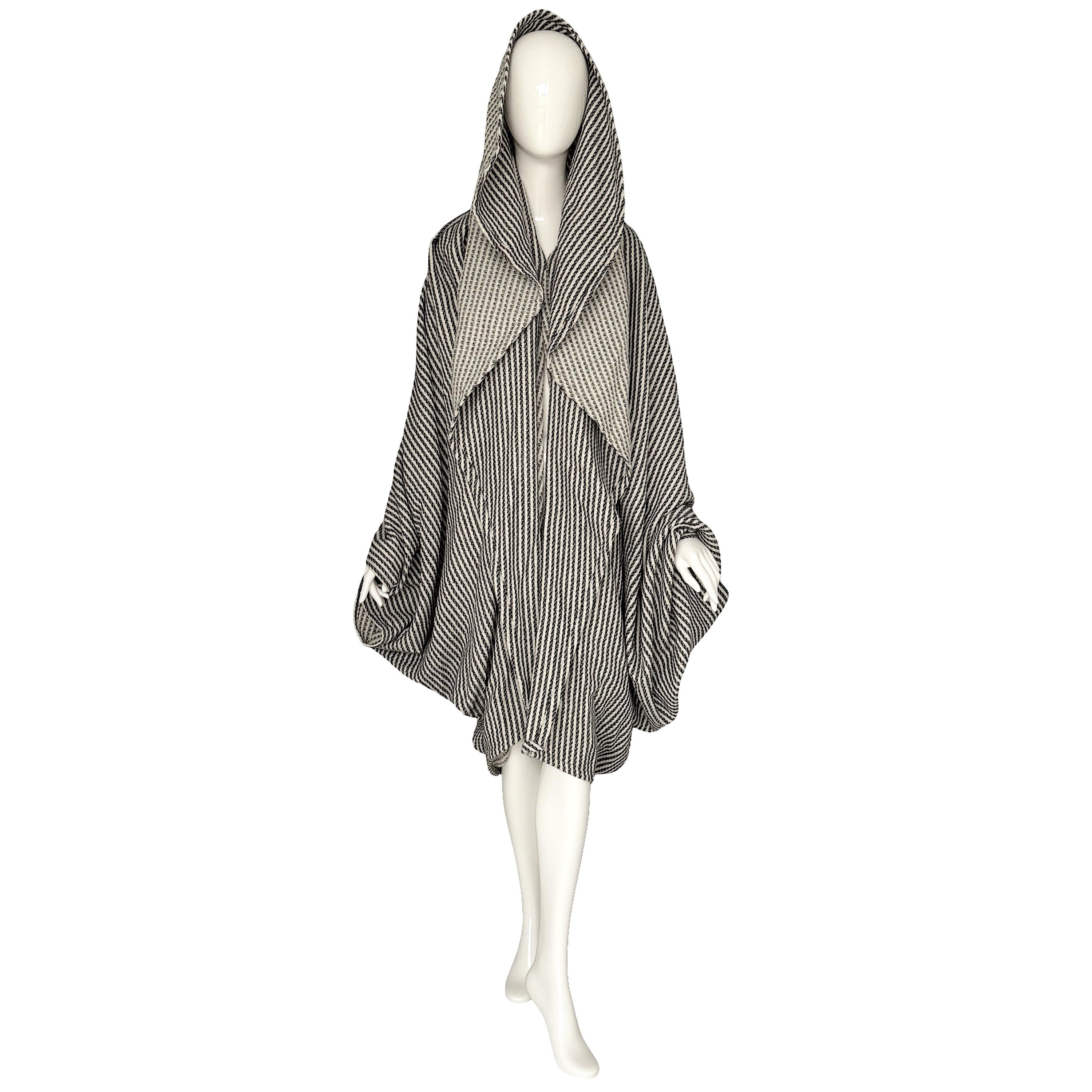 Rare Emanuel Ungaro Parallèle 1980s cocoon coat in striking black and white stripes. 
Crafted from a soft, lightweight wool-cotton blend. 
An oversized silhouette from the Ungaro archives. Excellent vintage condition. 
Free size 