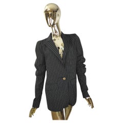 Emanuel Ungaro: blazer a righe con maniche increspate