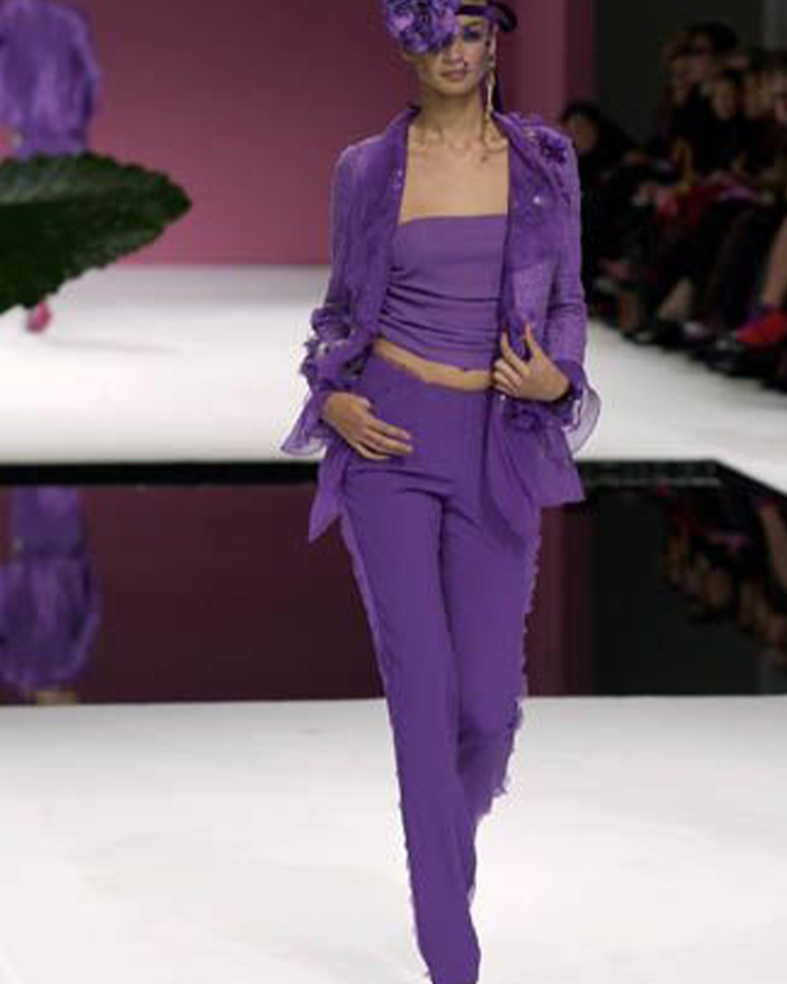 - Designed by Emanuel Ungaro
- Sold by Skof.Archive
- Spring Summer 2001 
- Runway Piece
- Purple Silk Pants
- Lateral chiffon details
- Straight fit
- Made in Italy
- Excellent Condition
- Made in Italy
- Materials: 90% Wool. 10% Silk / Lining: