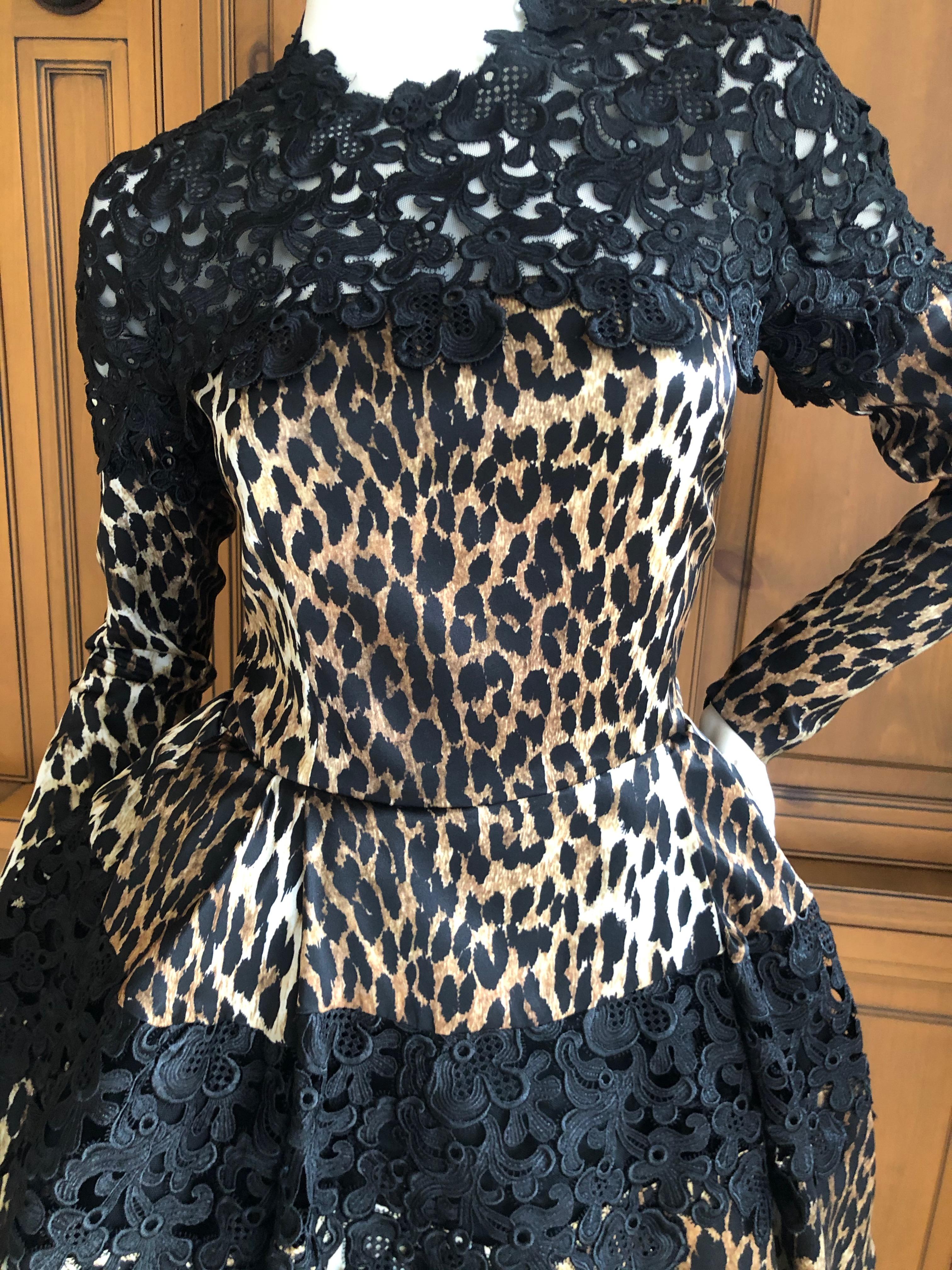 Emanuel Ungaro Seventies Guipure Lace Leopard Print Pouf Mini Dress.
This is so pretty with a very structured horsehair petticoat underneath. 
Much prettier in person.
These vintage French dresses are so beautifully made, this has four