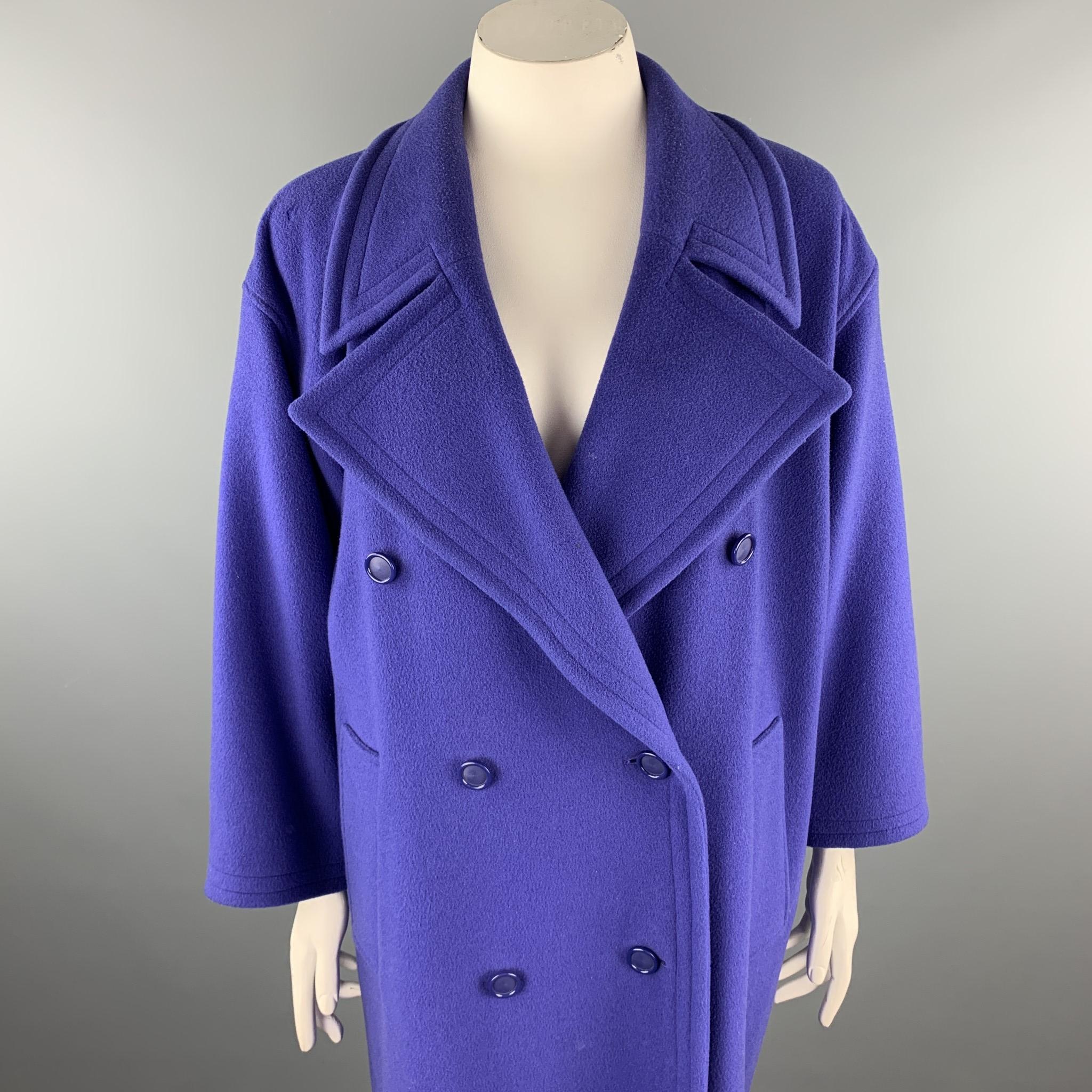 EMANUEL UNGARO coat comes in a purple wool / nylon with a full liner featuring a notch lapel, back belt, and a double breasted closure. Made in Italy.

Good Pre-Owned Condition.
Marked: 46/12

Measurements:

Shoulder: 22 in. 
Chest: 48 in. 
Sleeve: