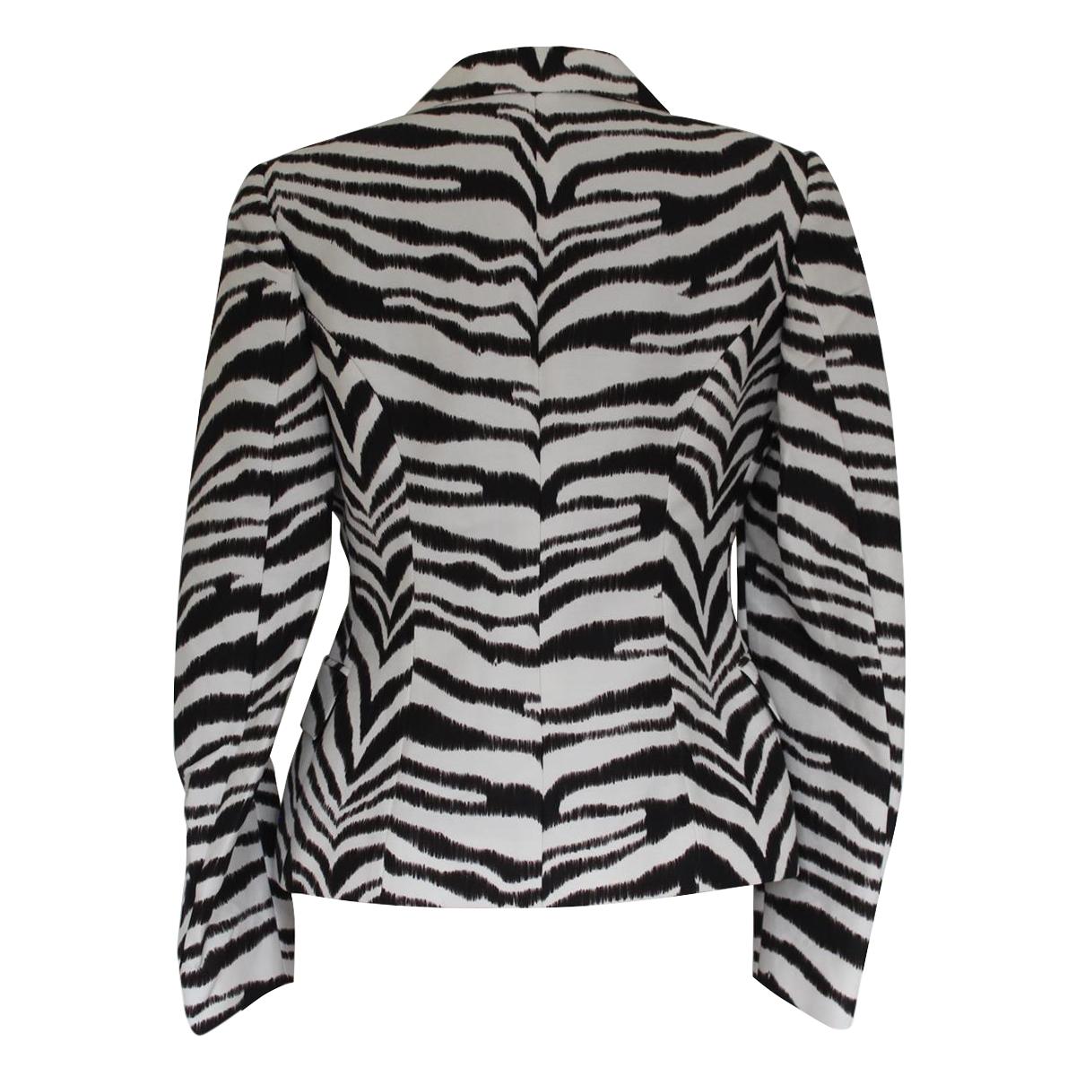 Super chic Ungaro jacket
Cotton (60%) Rayon
Black and white color
Zebra print
Automatic buttons closure
Two pockets
Length shoulder/hem cm 53 (20.8 inches)
Shoulder length cm 39 (15.3 inches)
WORLDWIDE EXPRESS SHIPPING INCLUDED IN THE PRICE !