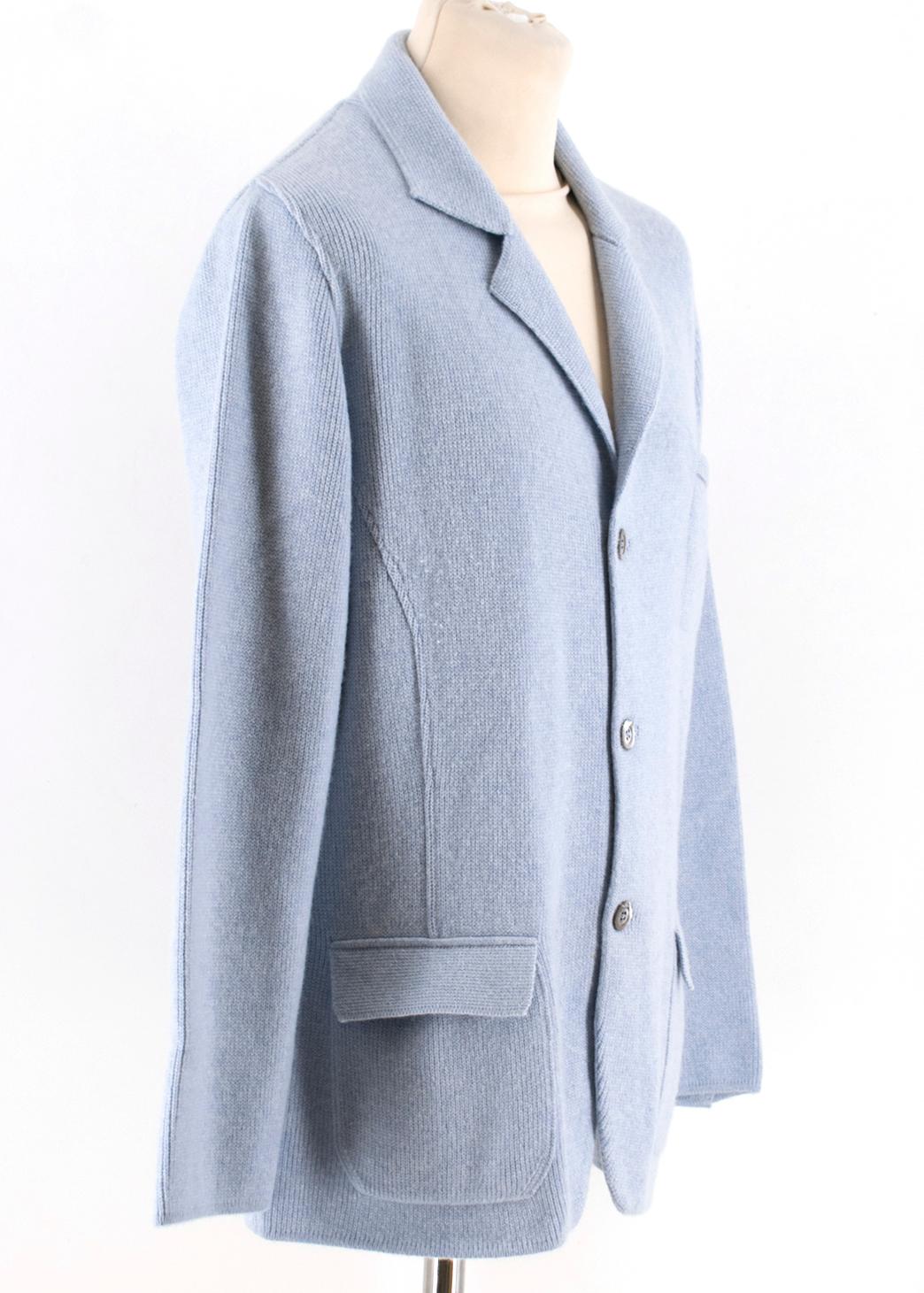 Emanuele Maffeis baby blue cashmere shirt 

100% cashmere;
two front square pockets;
button closure;
dark blue elbow patches;
Made in Italy

Please note, these items are pre-owned and may show signs of
being stored even when unworn and unused. This