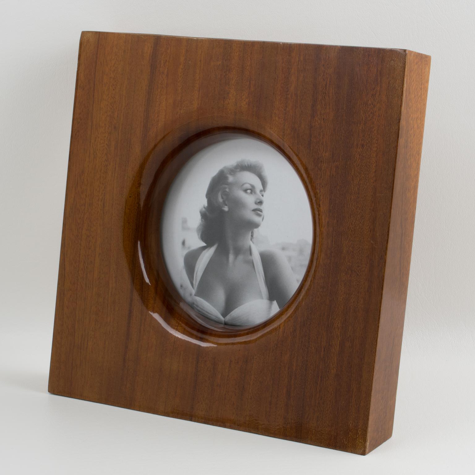 Emanuele Pantanella (1939-2014), Italy, designed this sumptuous picture photo frame. Solid tropical wood with a high gloss polished finish in a minimalist geometric shape. Emanuele Pantanella designs are modern-day Objects of Vertu, an extreme