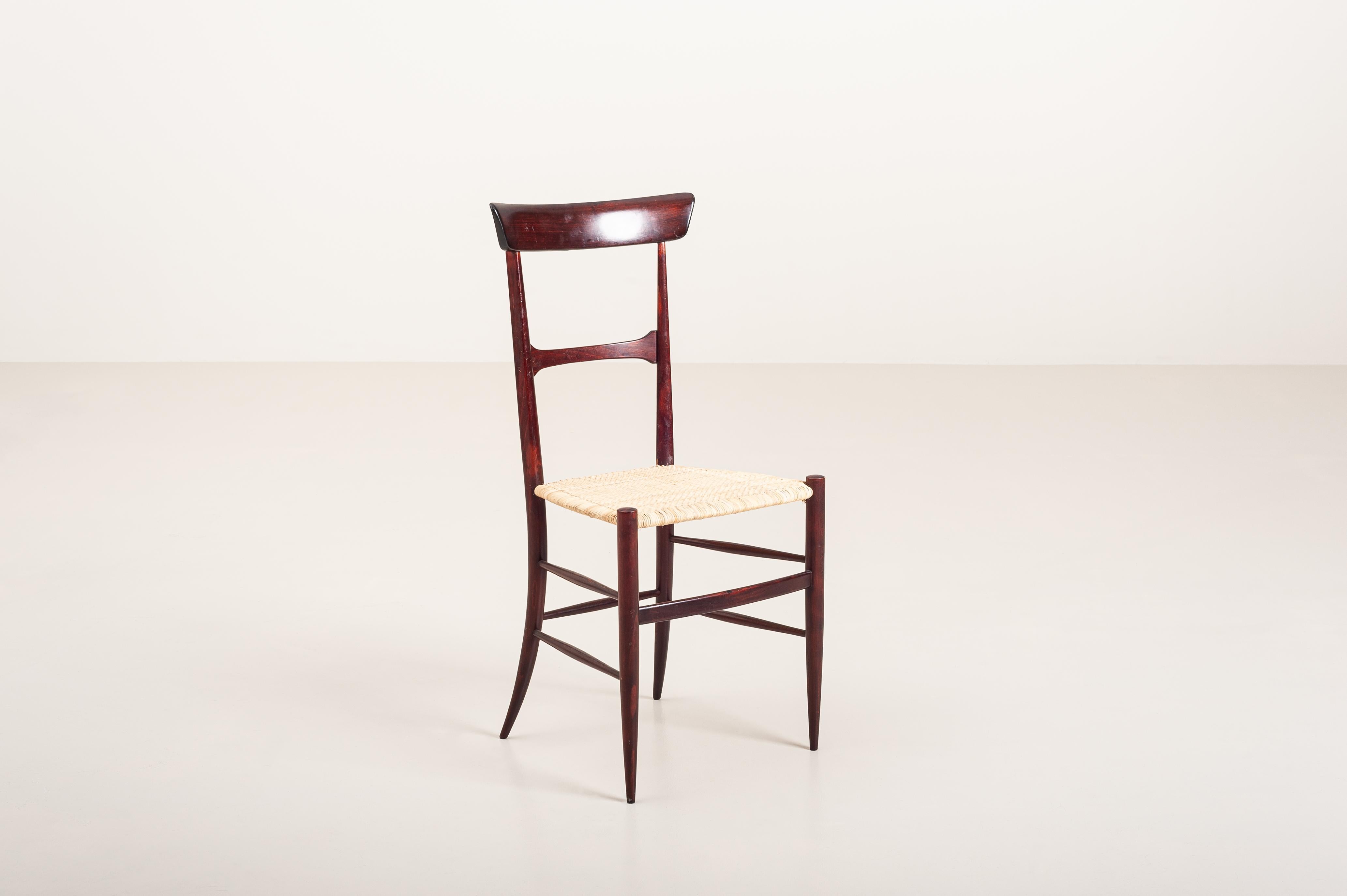 A very rare set of six dining chairs ''Leggerissima'' (ultralight) model designed by Emanuele Rambaldi and manufactured by Figli di Sanguineti G.B. 

Made of beech painted in a rosewood essence, this model has a frame which weight just 1,65 kg