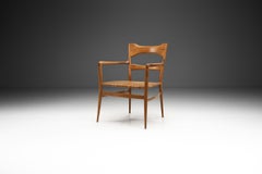 Emanuele Rambaldi Sillón de madera de frutal con asiento de caña tejida, Italia Años 50