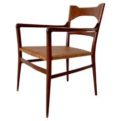 Emanuele Rambaldi, poltrona in legno e canna intrecciata, Italia anni '50