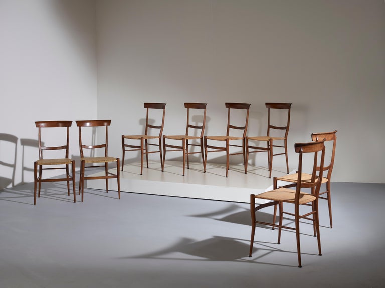 An unique set of eight Chiavari dining chair designed by Emanuele Rambaldi and produced by Figli di Sanguineti Colombo.

Made in beech and cane the 'Ramba' model is the second attempt of the prolific collaboration between the artist and this