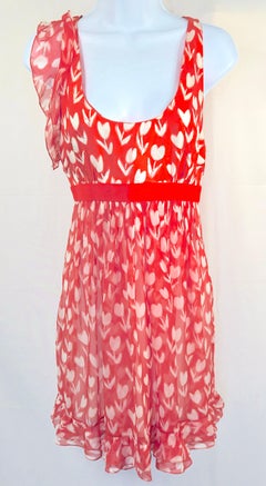 EmanuelUngaroMiniVestido rojo con volantes de gasa y estampado de tulipanes de seda con falda de cintura imperio